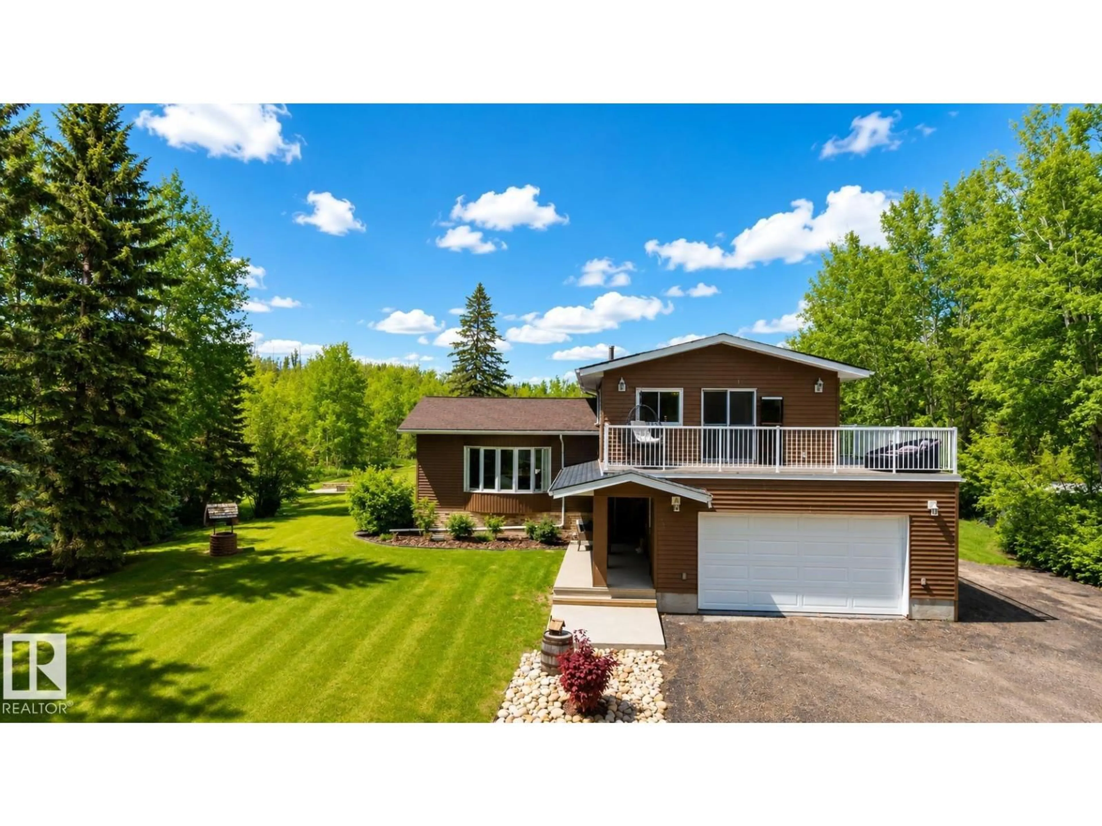 A pic from outside/outdoor area/front of a property/back of a property/a pic from drone, unknown for 100 22549 TWP RD, Rural Leduc County Alberta T8C1H1