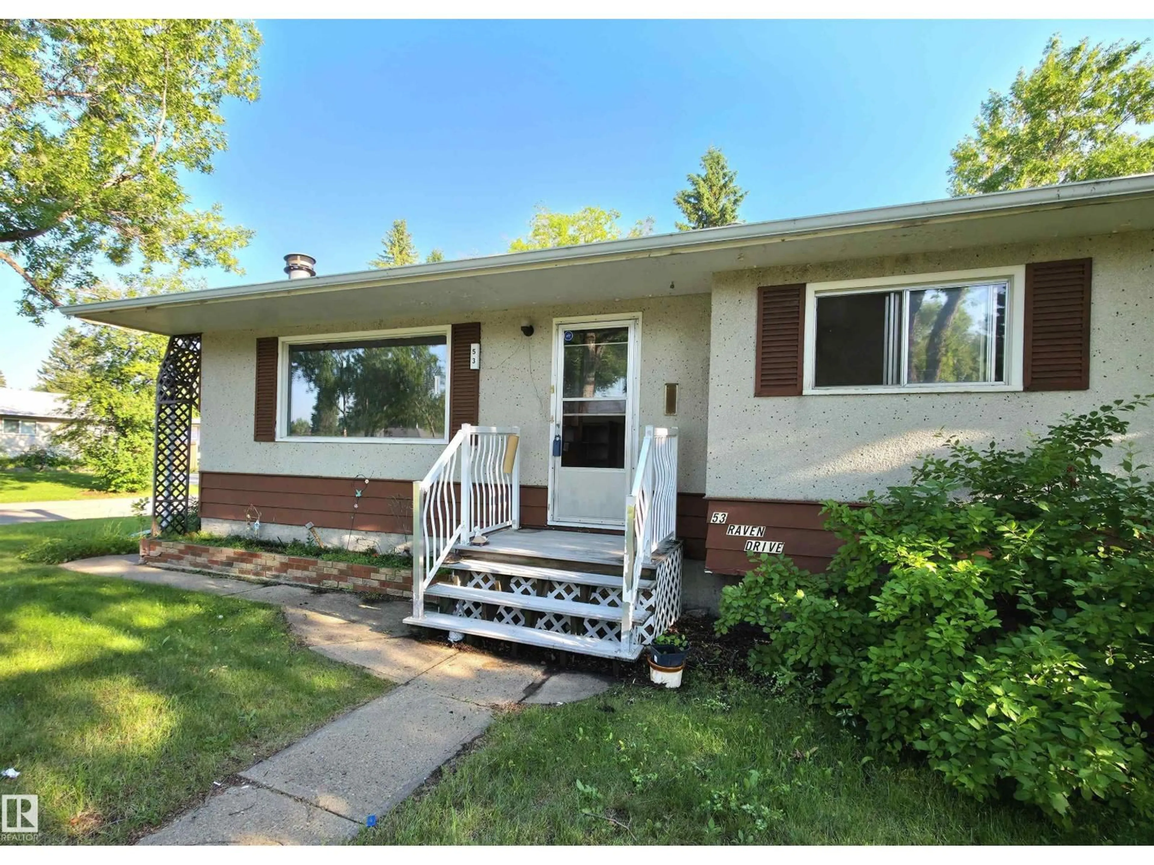 Home with vinyl exterior material, street for 53 RAVEN DR, Sherwood Park Alberta T8A0C6