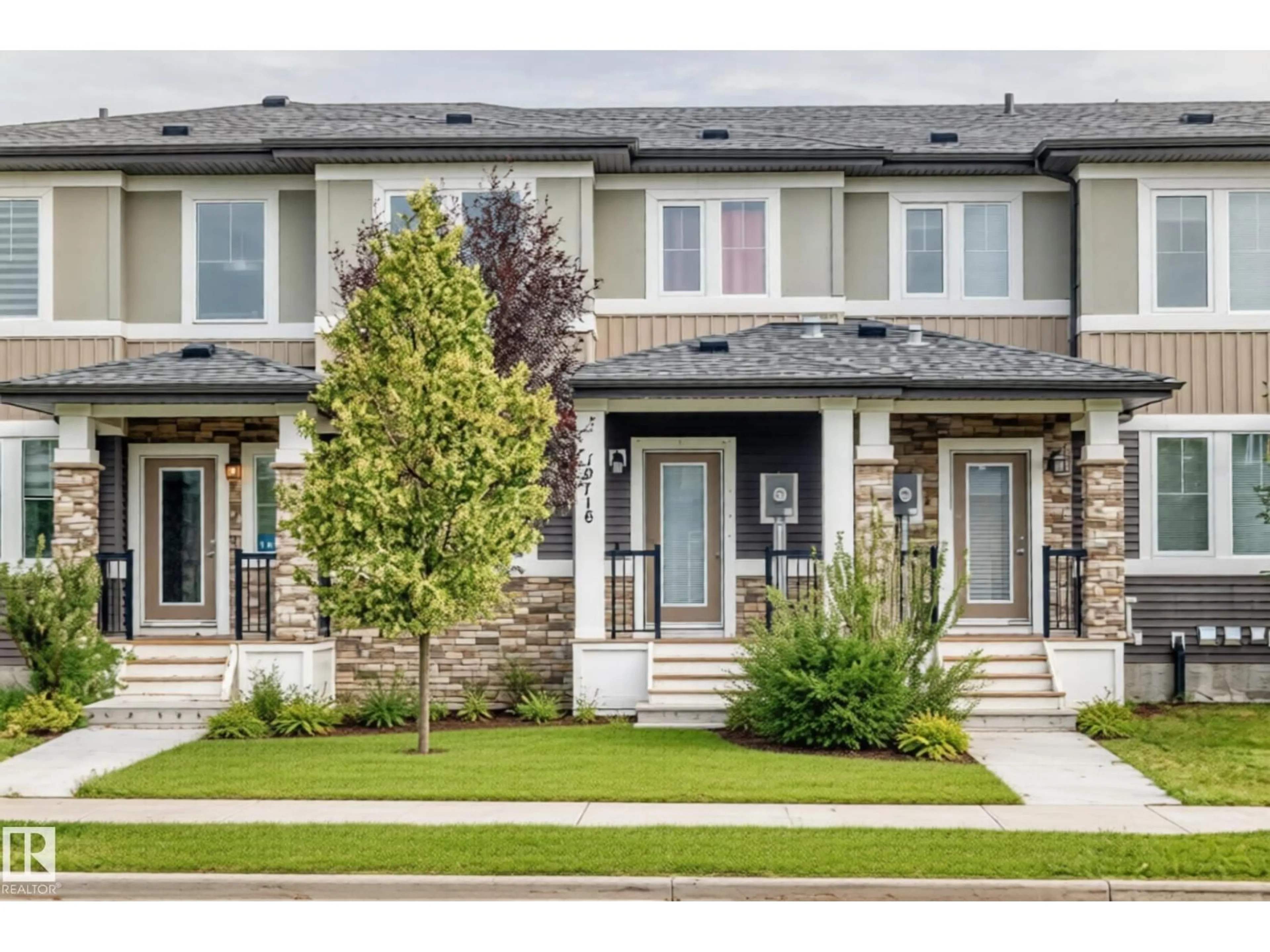 Home with vinyl exterior material, street for NW - 19716 27 AV, Edmonton Alberta T6M0X1