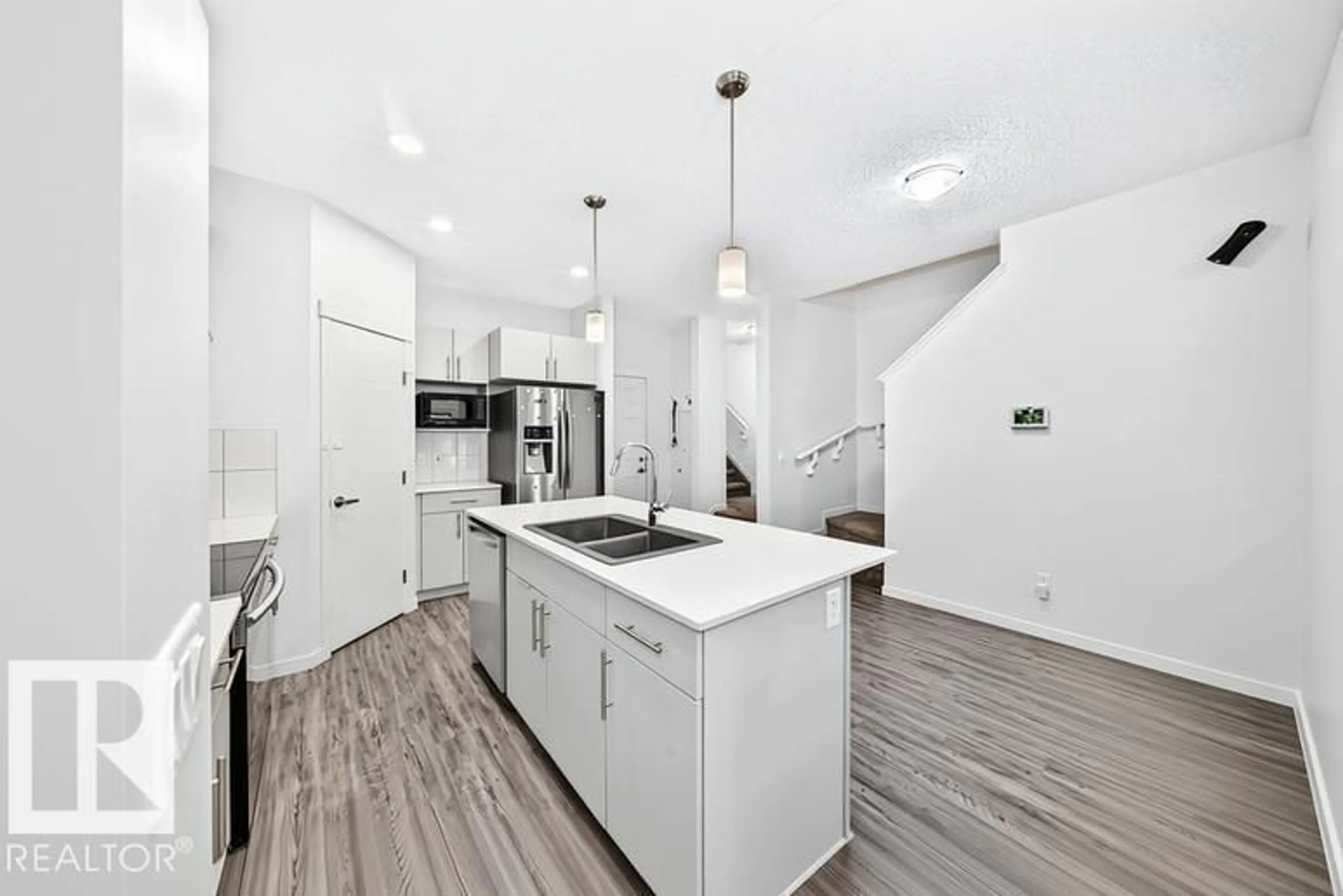 Open concept kitchen, unknown for NW - 19716 27 AV, Edmonton Alberta T6M0X1
