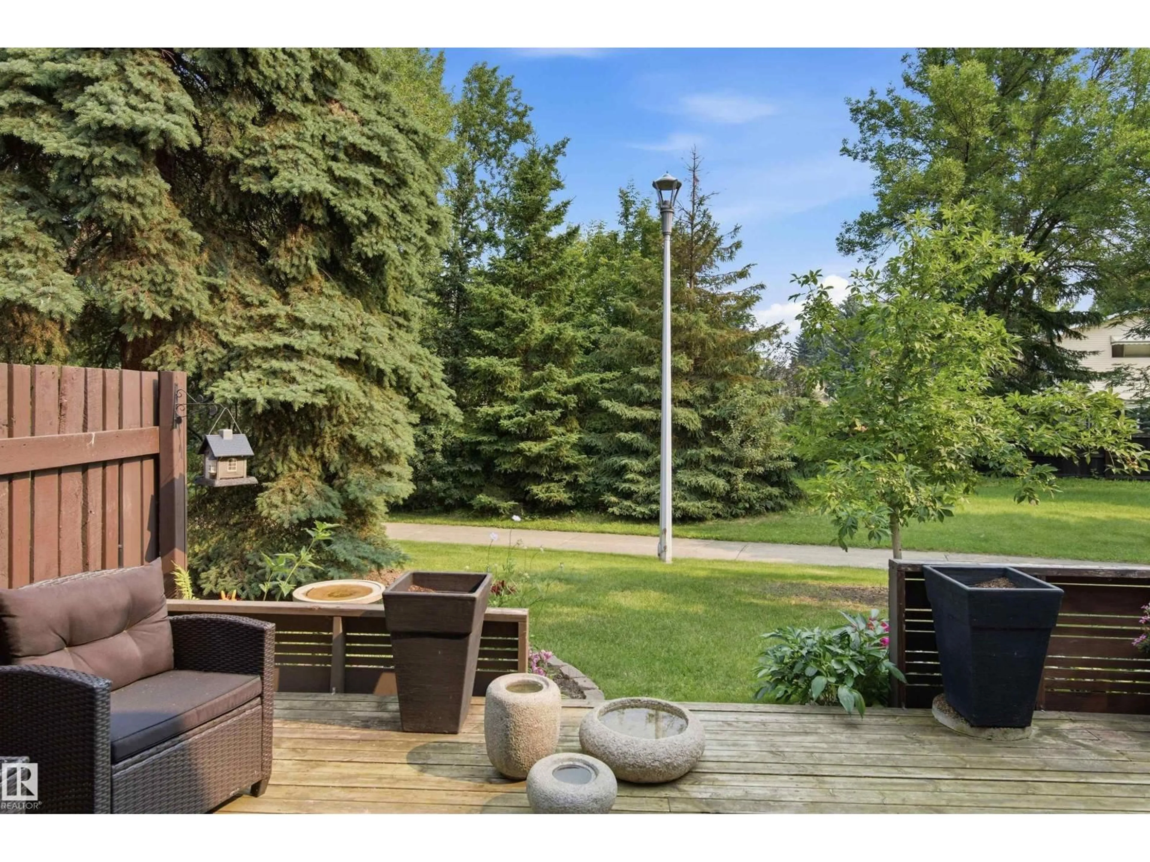 Patio, forest/trees view for 141 HEARTHSTONE NW, Edmonton Alberta T6H5E5