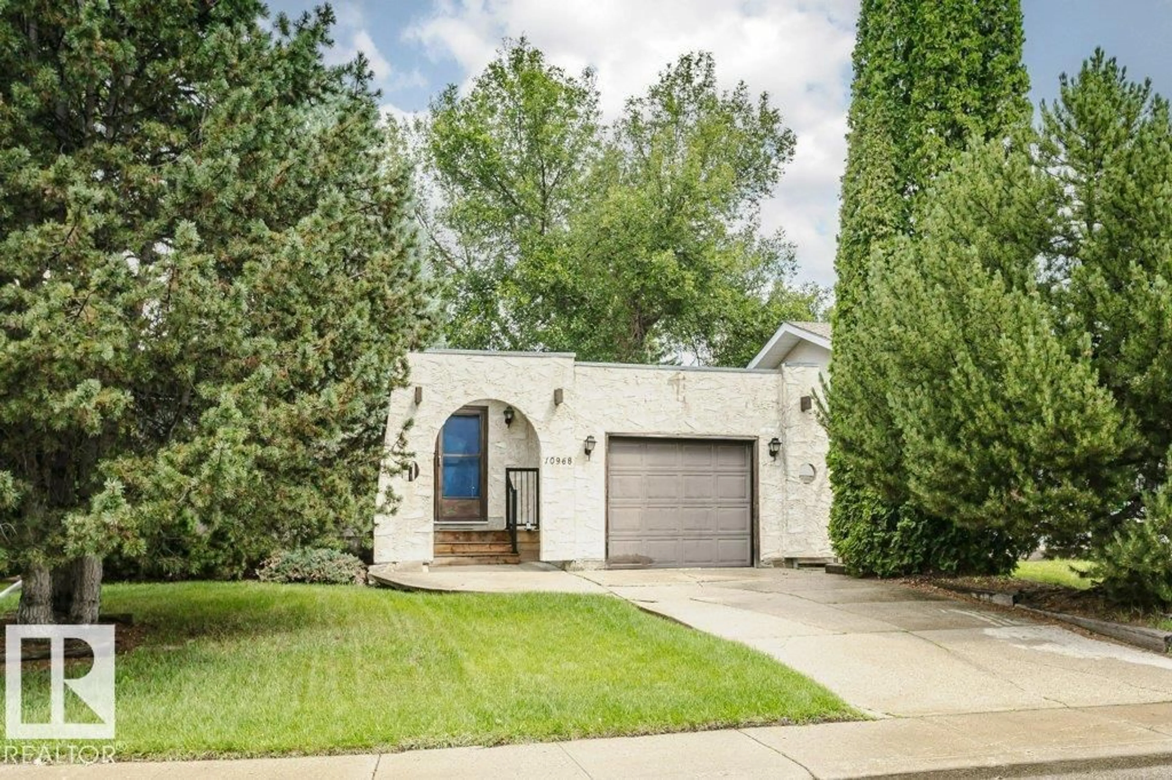 Home with brick exterior material, street for NW - 10968 35 AV, Edmonton Alberta T6J2V3