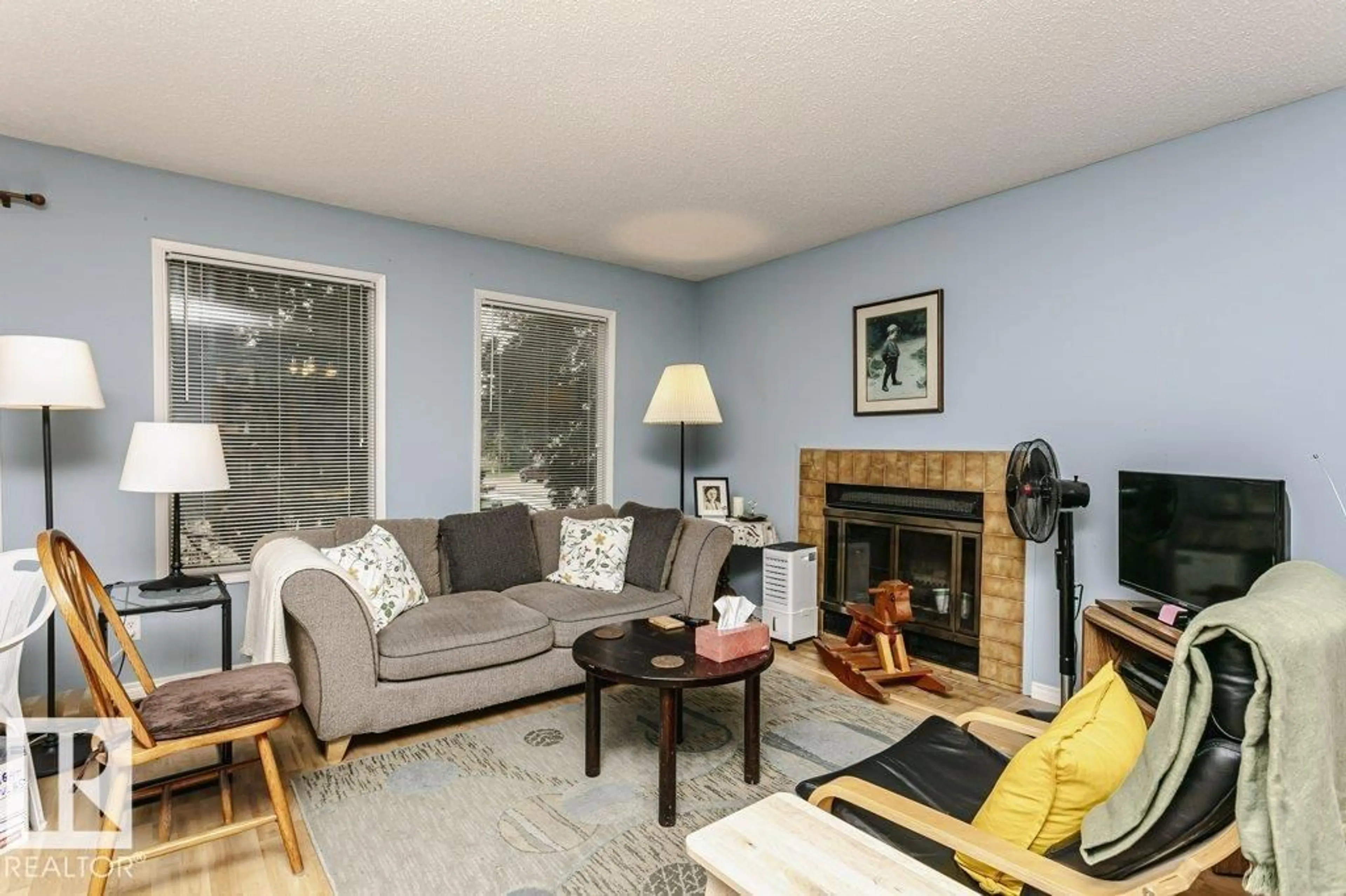 Living room with furniture, unknown for NW - 10968 35 AV, Edmonton Alberta T6J2V3