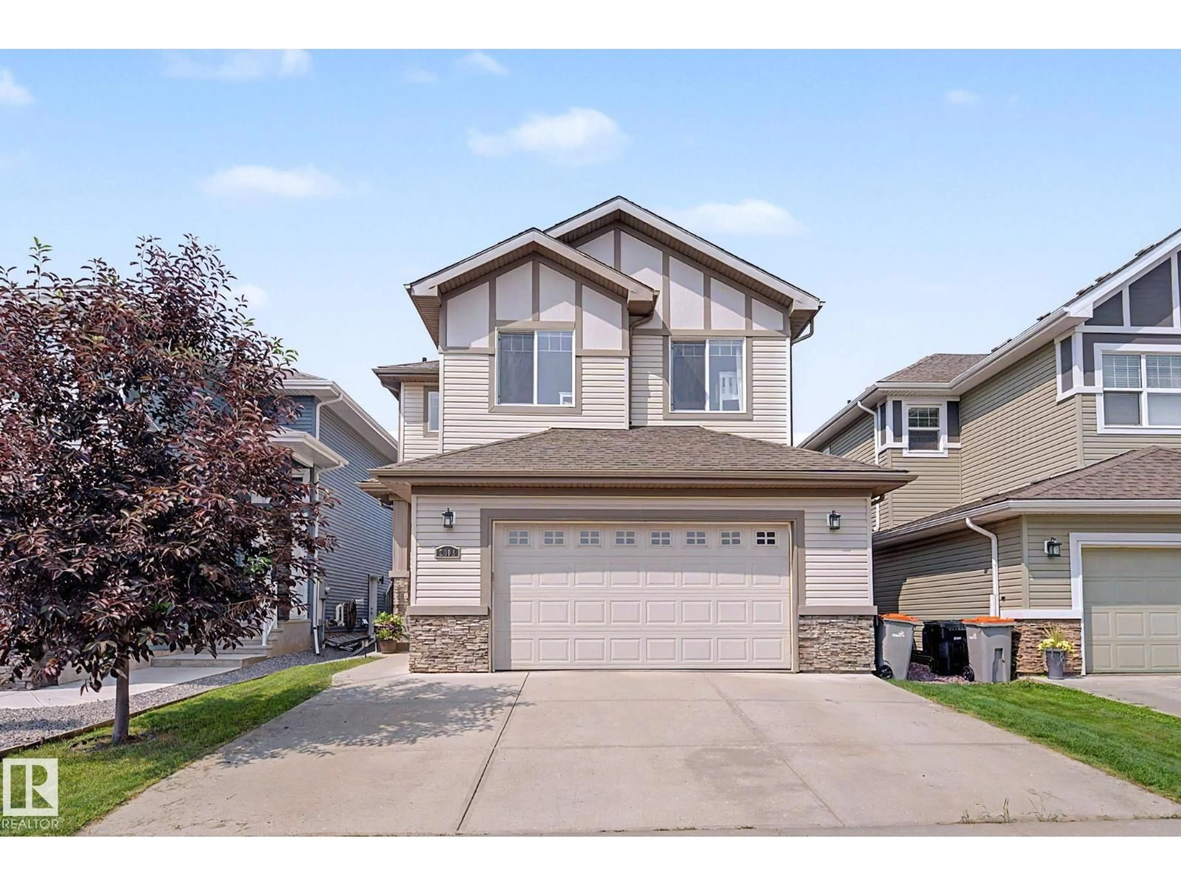 Home with vinyl exterior material, street for 2004 SOUTH CREEK DR, Stony Plain Alberta T7Z0J7