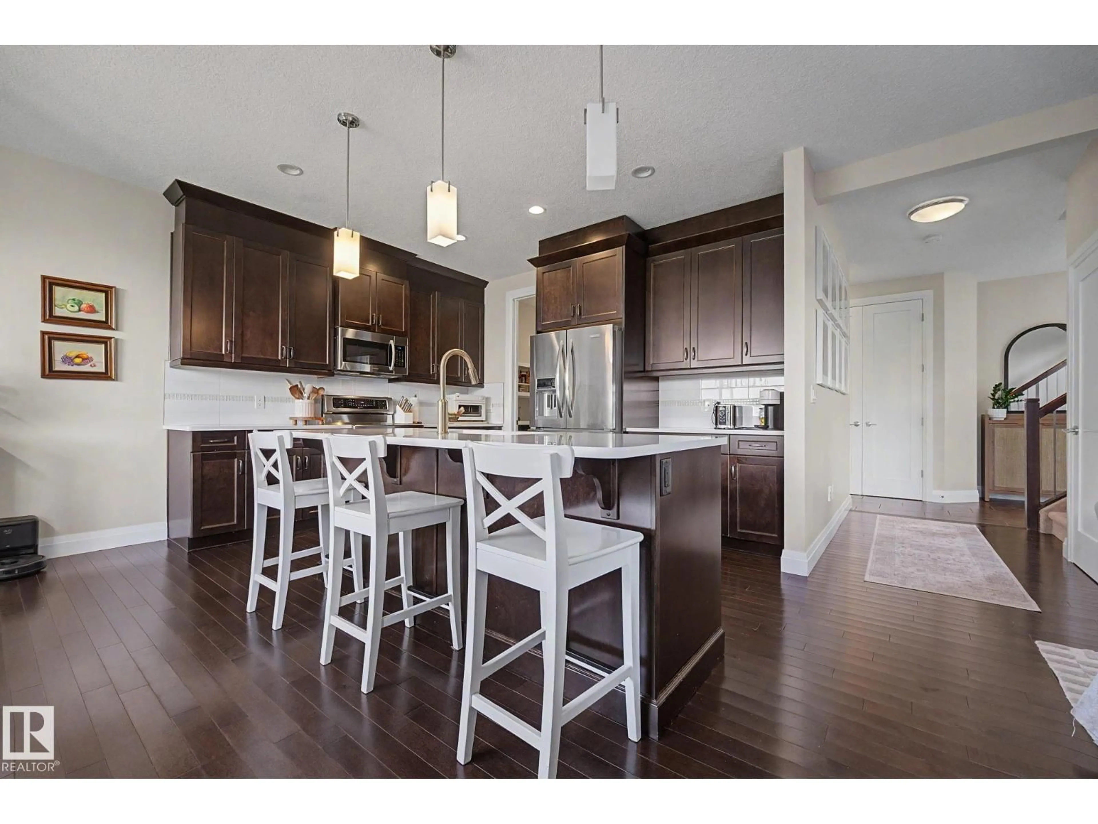 Open concept kitchen, wood/laminate floor for 2004 SOUTH CREEK DR, Stony Plain Alberta T7Z0J7