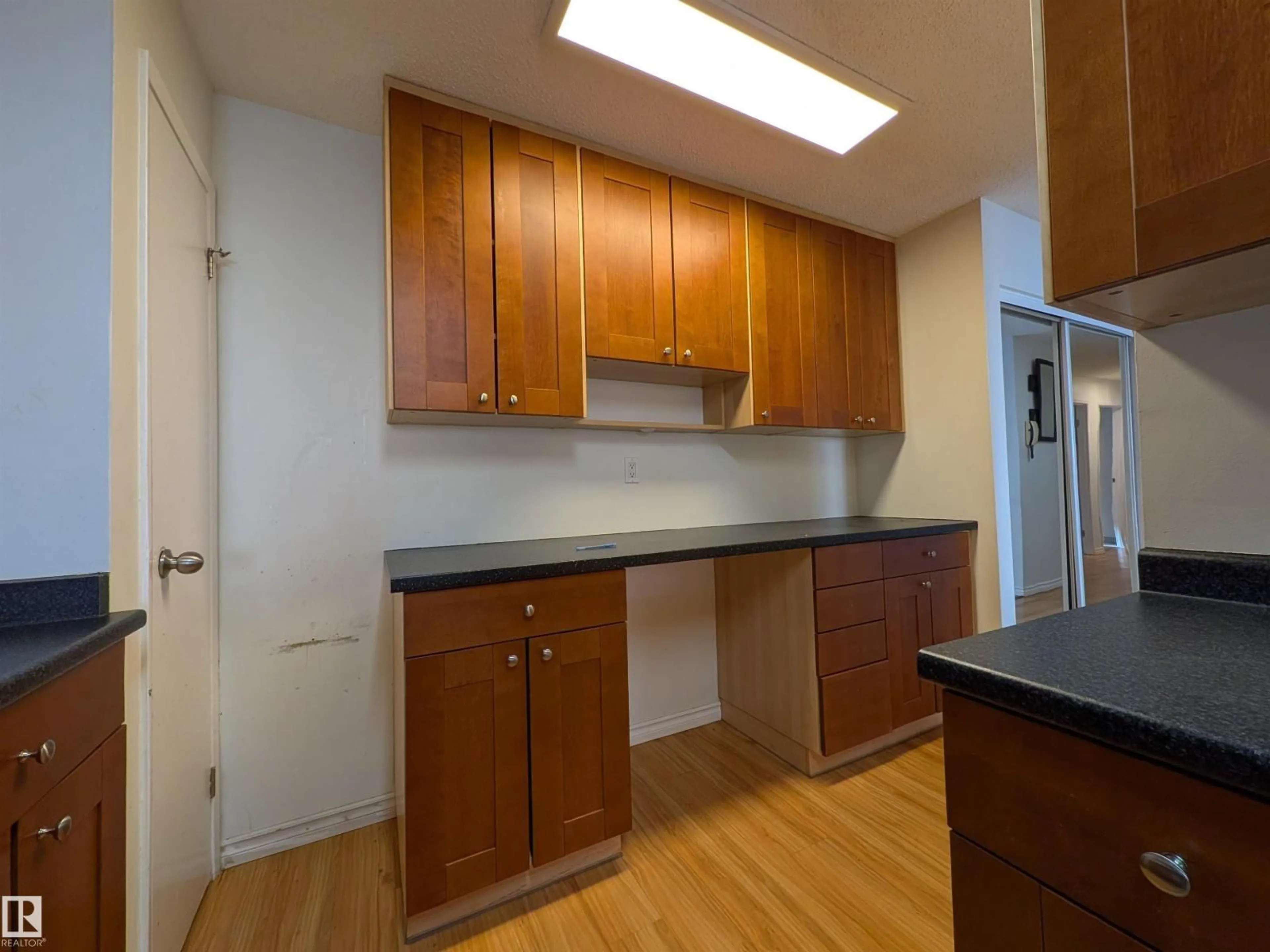Standard kitchen, wood/laminate floor for #109 - 7220 144 AV NW, Edmonton Alberta T5C3E4