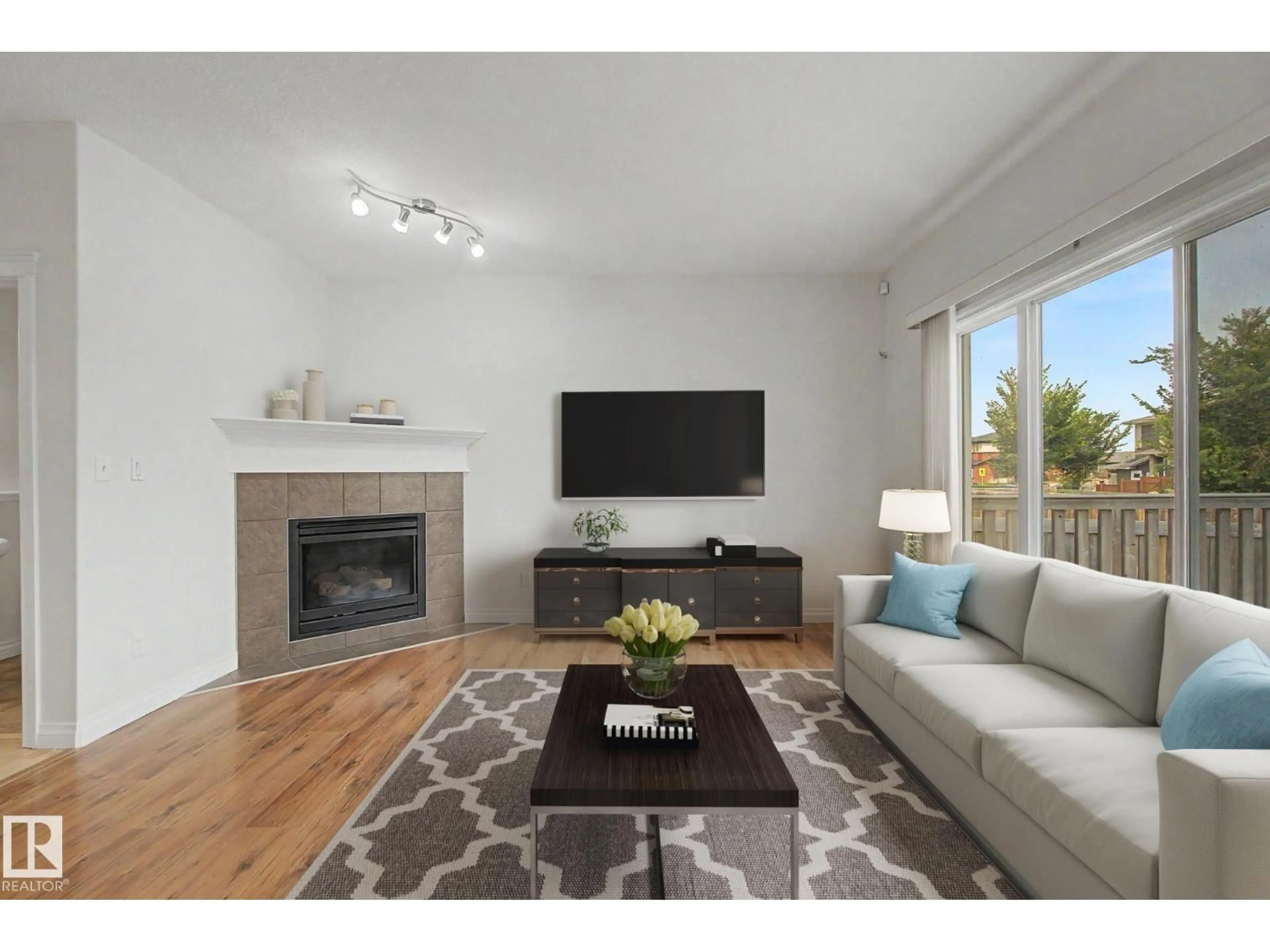 Living room with furniture, wood/laminate floor for 66 VANESSA AV, Spruce Grove Alberta T7X0H1