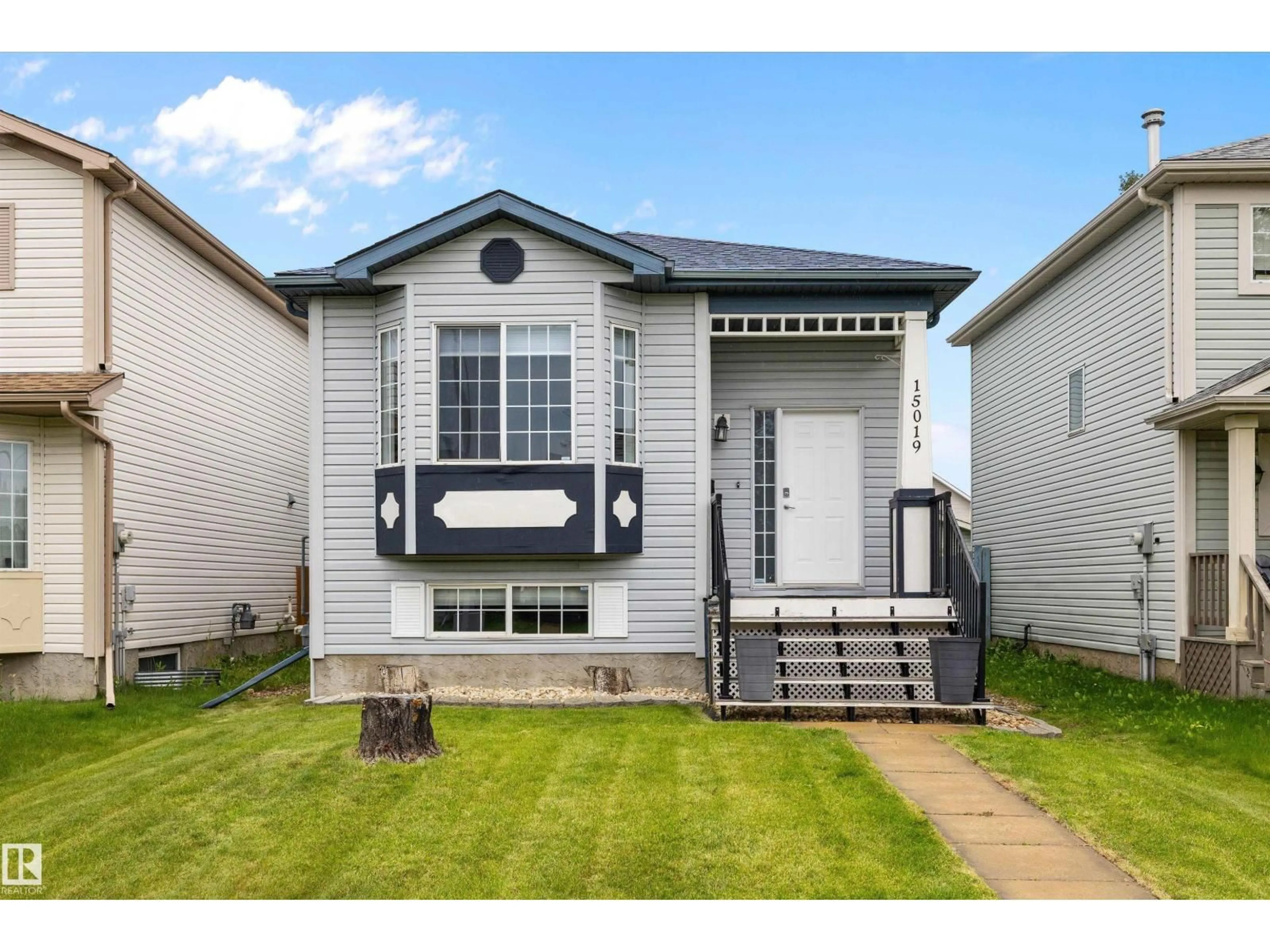Home with vinyl exterior material, street for NW - 15019 133 ST, Edmonton Alberta T6V1K9