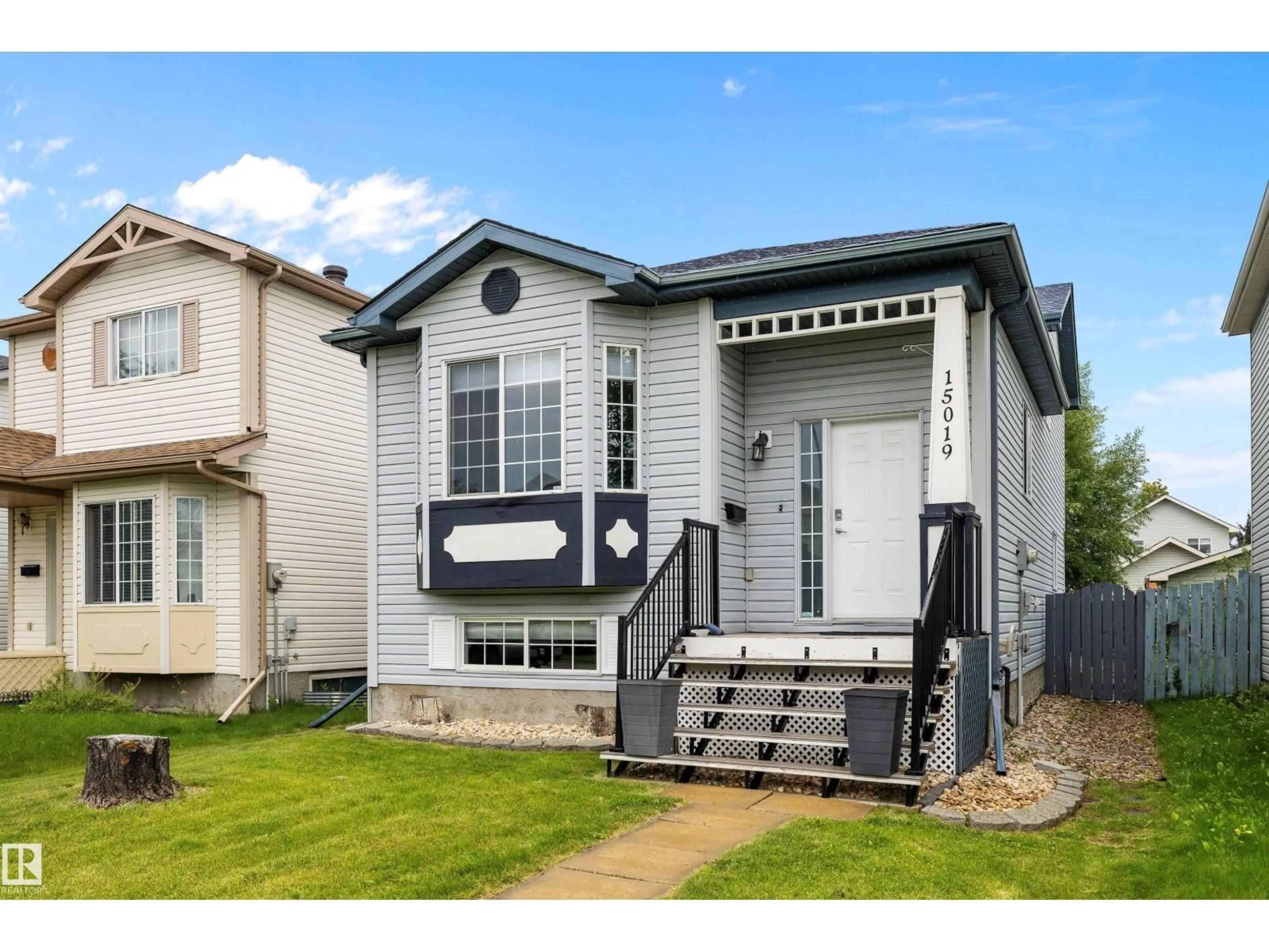 Home with vinyl exterior material, street for NW - 15019 133 ST, Edmonton Alberta T6V1K9