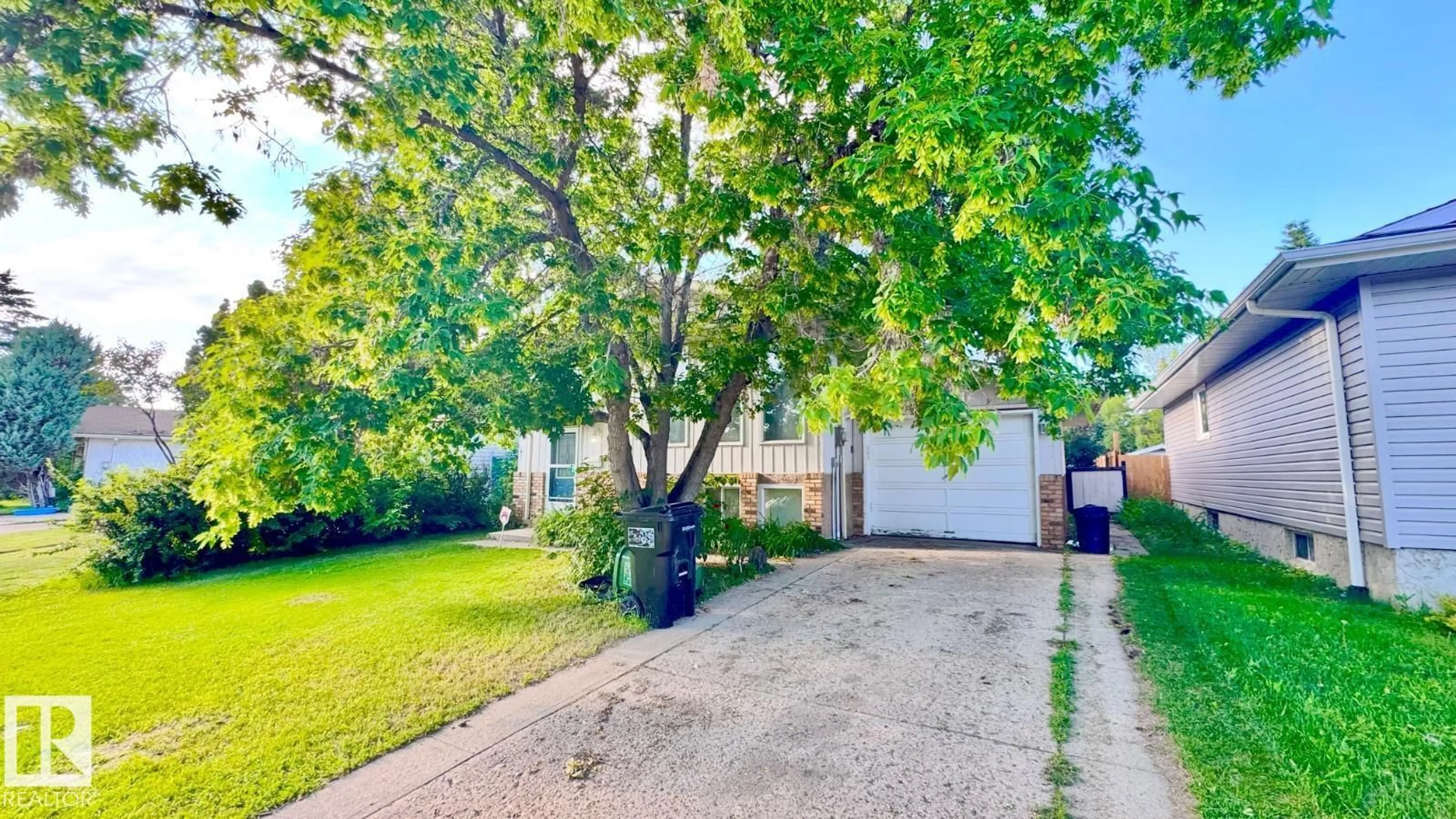 A pic from outside/outdoor area/front of a property/back of a property/a pic from drone, street for 5144 37 AV NW, Edmonton Alberta T6L1C8