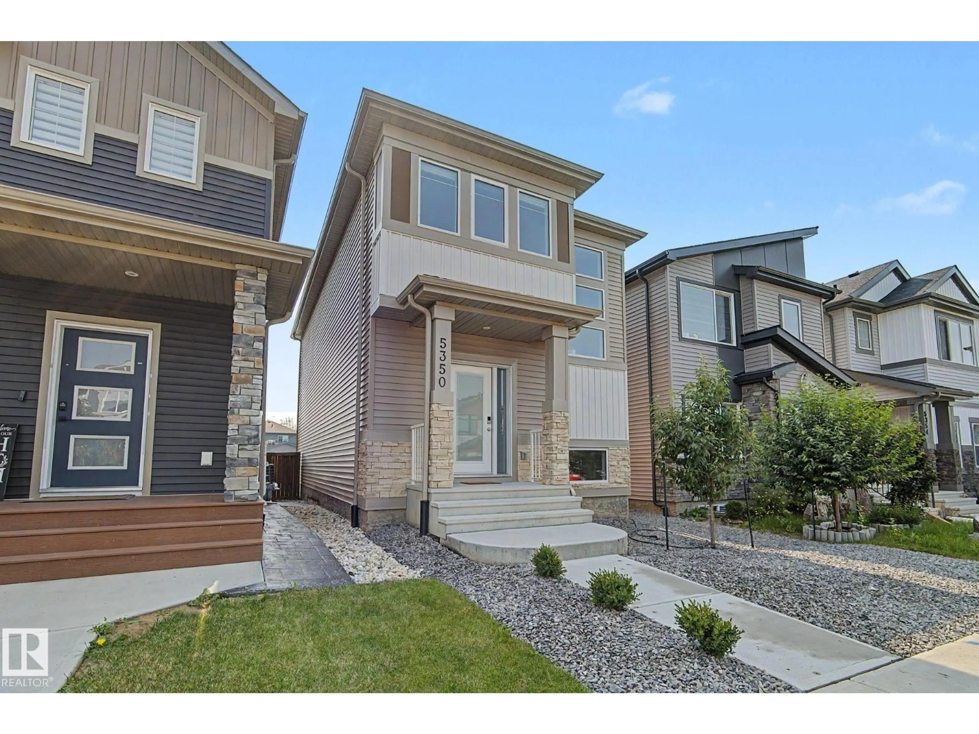 Home with vinyl exterior material, street for 5350 LARK LANDING LD, Edmonton Alberta T5S0S2