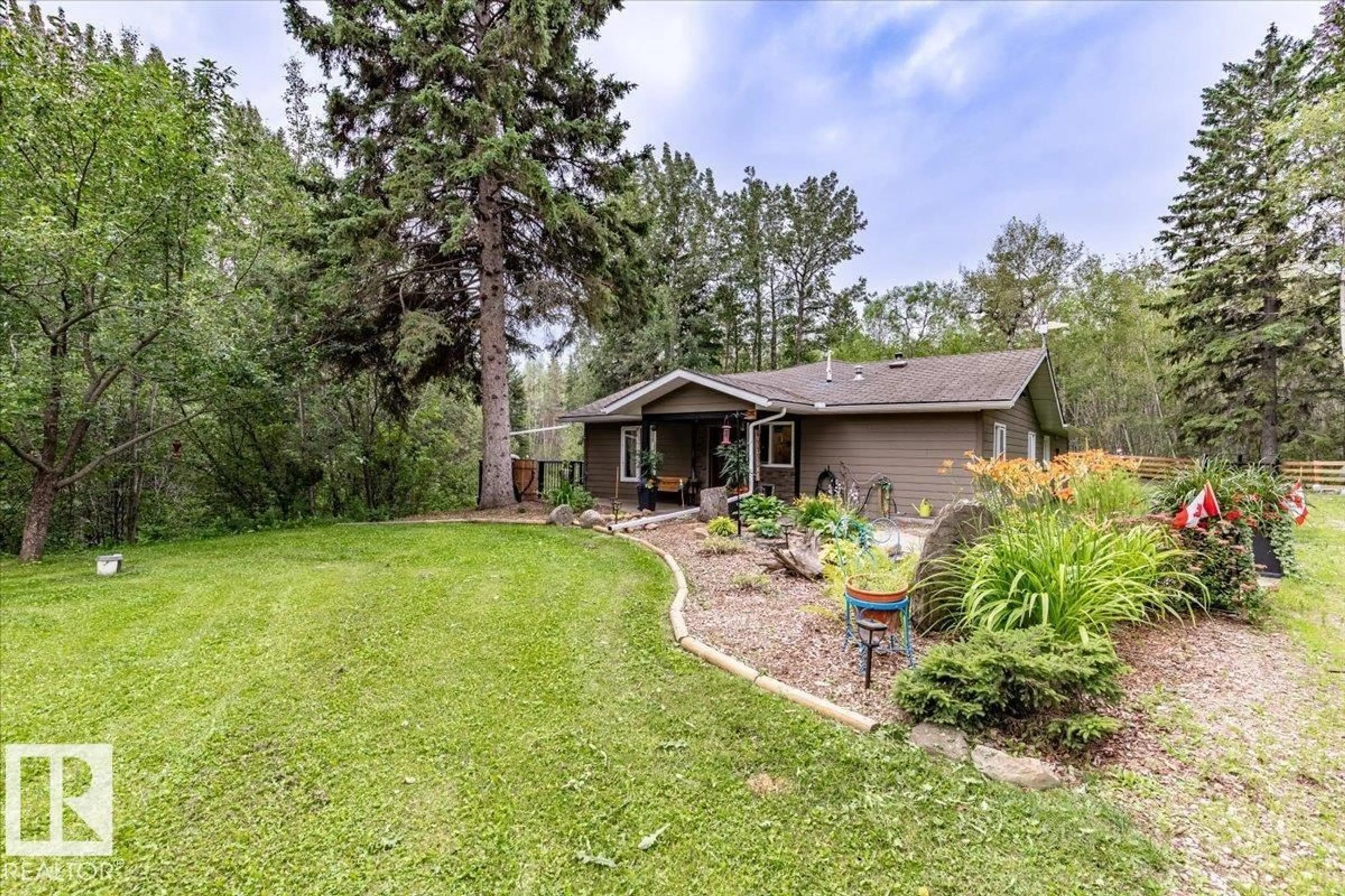 A pic from outside/outdoor area/front of a property/back of a property/a pic from drone, water/lake/river/ocean view for 12055 TWP ROAD 454, Rural Wetaskiwin County Alberta T0C2V0