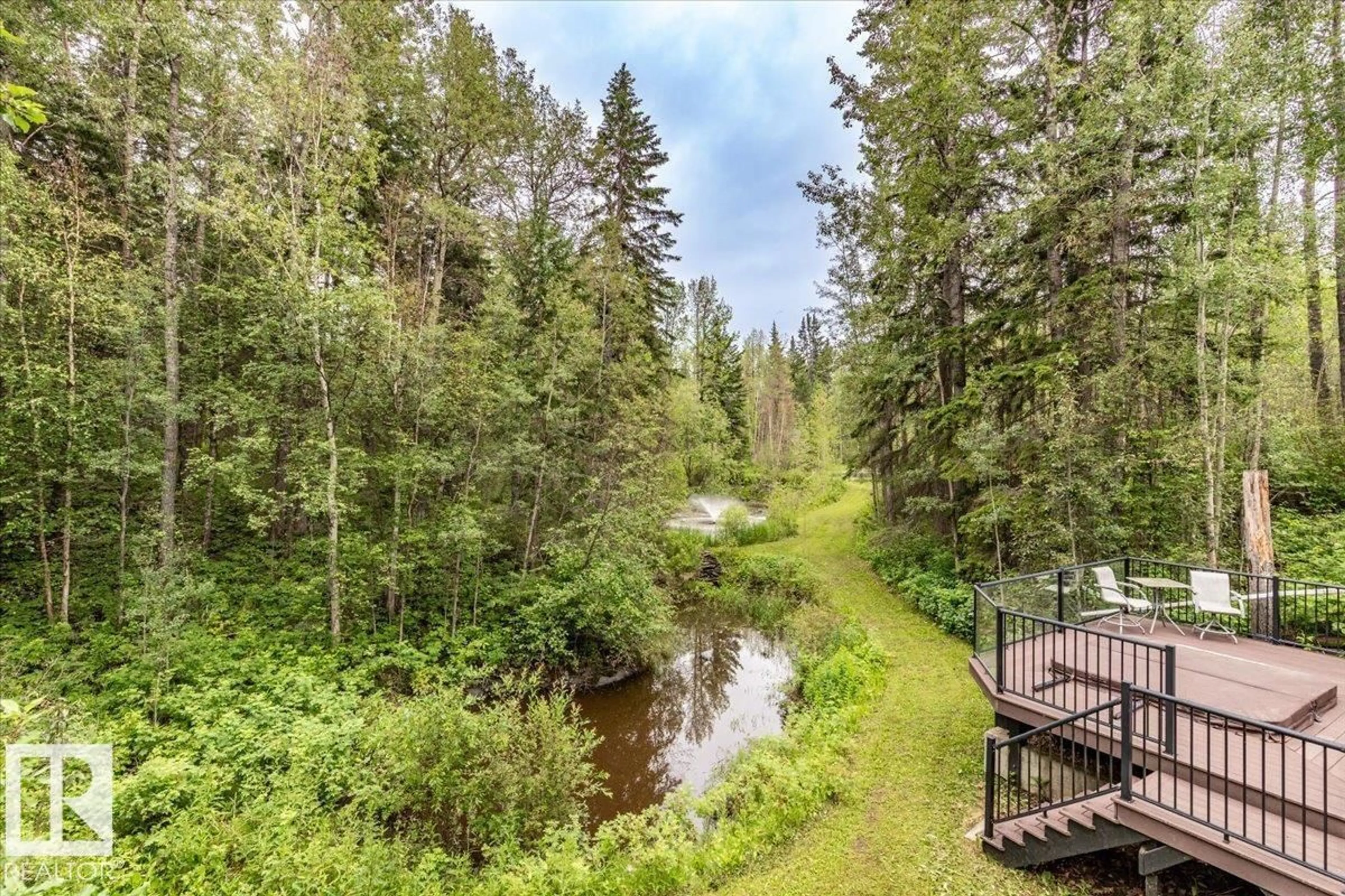 A pic from outside/outdoor area/front of a property/back of a property/a pic from drone, forest/trees view for 12055 TWP ROAD 454, Rural Wetaskiwin County Alberta T0C2V0