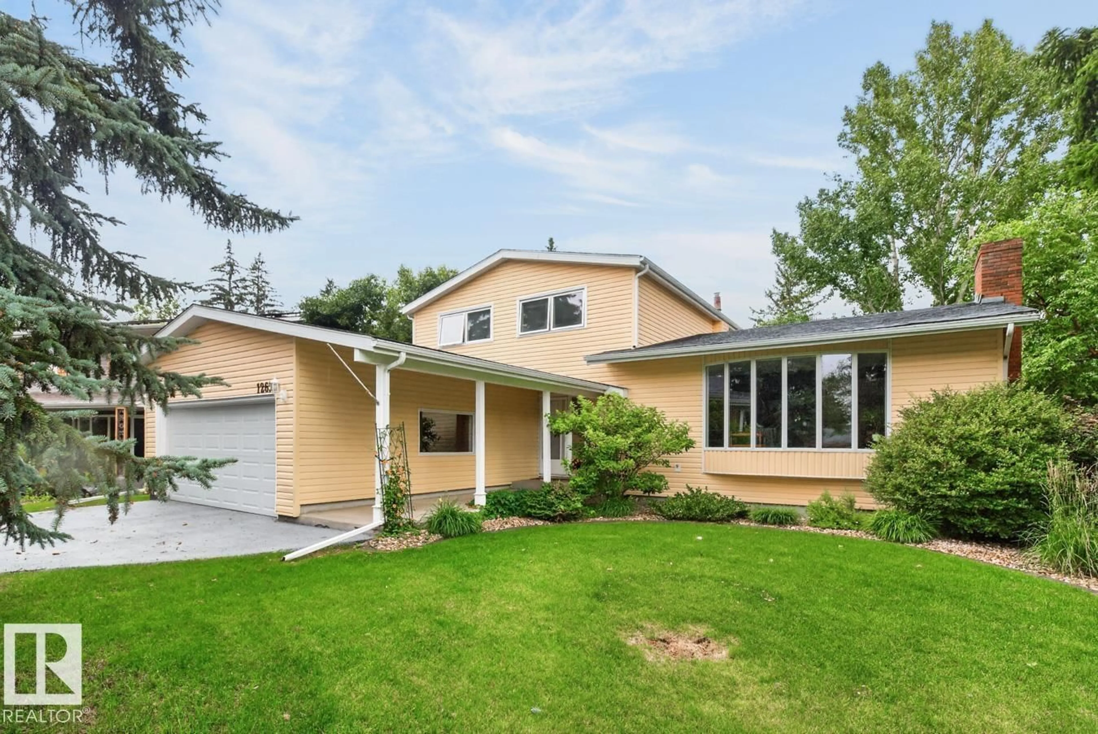 Home with vinyl exterior material, street for 12636 52 AV, Edmonton Alberta T6H0P7