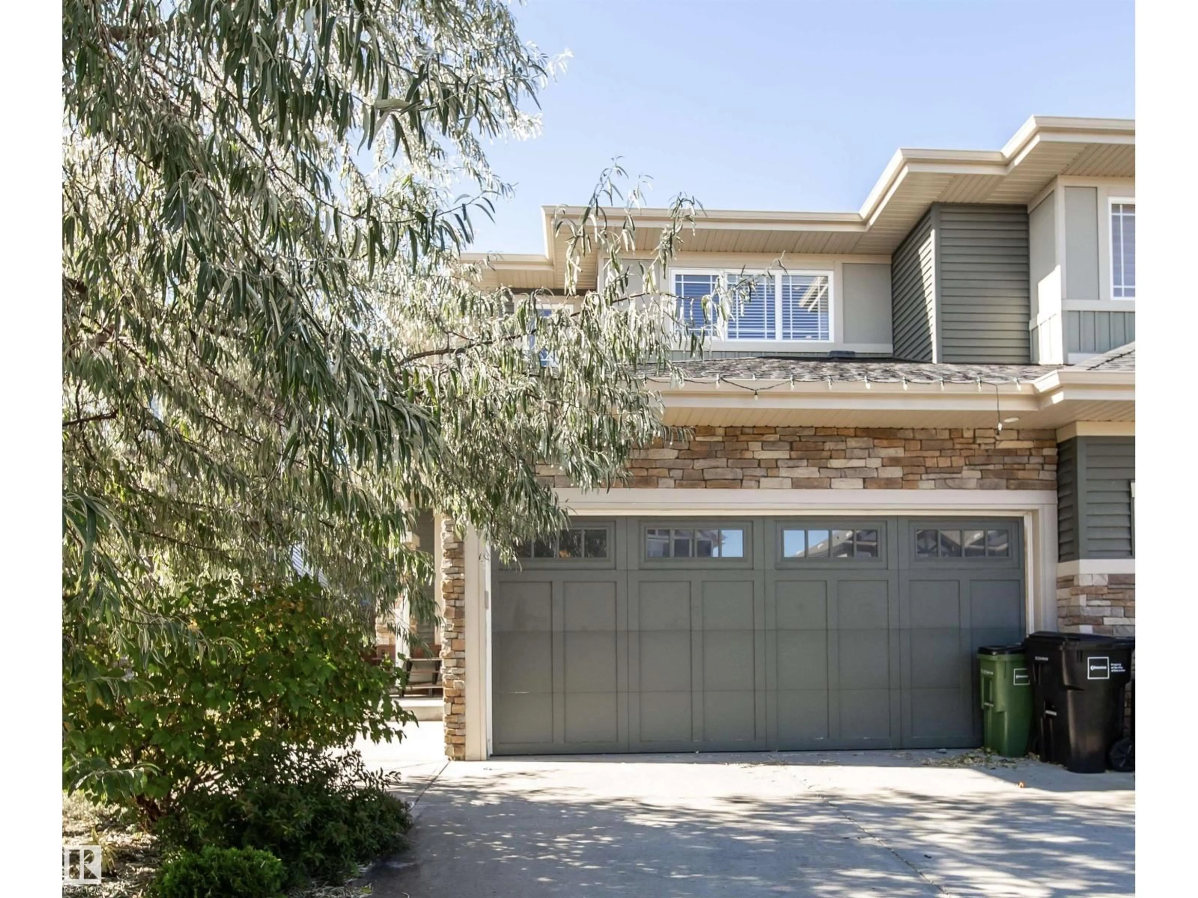 Home with brick exterior material, street for NW - 8916 217 ST, Edmonton Alberta T5T7C4