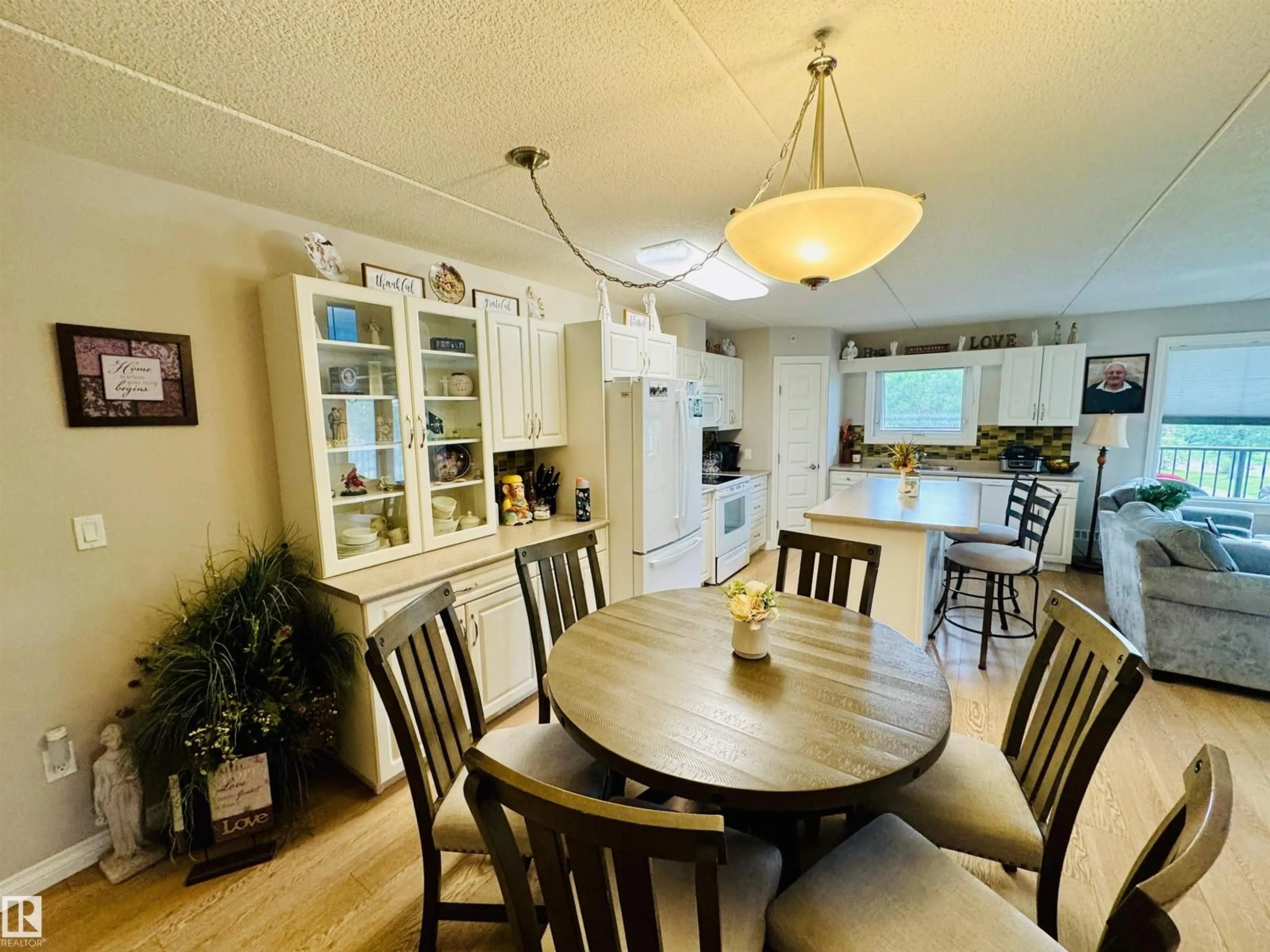 Dining room, wood/laminate floor for 208 - 4614A LAKESHORE DRIVE, St. Paul Town Alberta T0A3A3