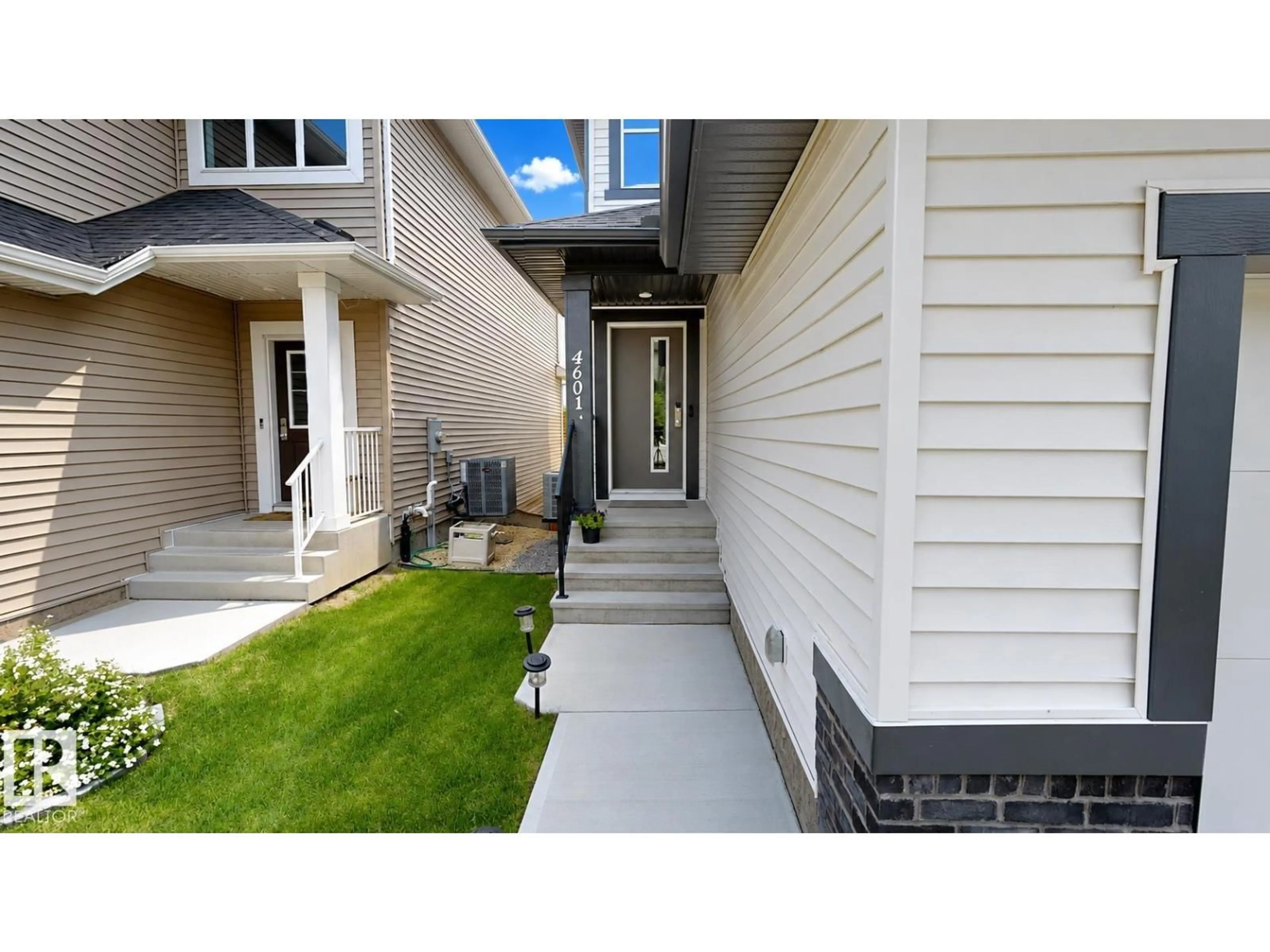 Home with vinyl exterior material, street for 4601 62 ST, Beaumont Alberta T4X2Z2
