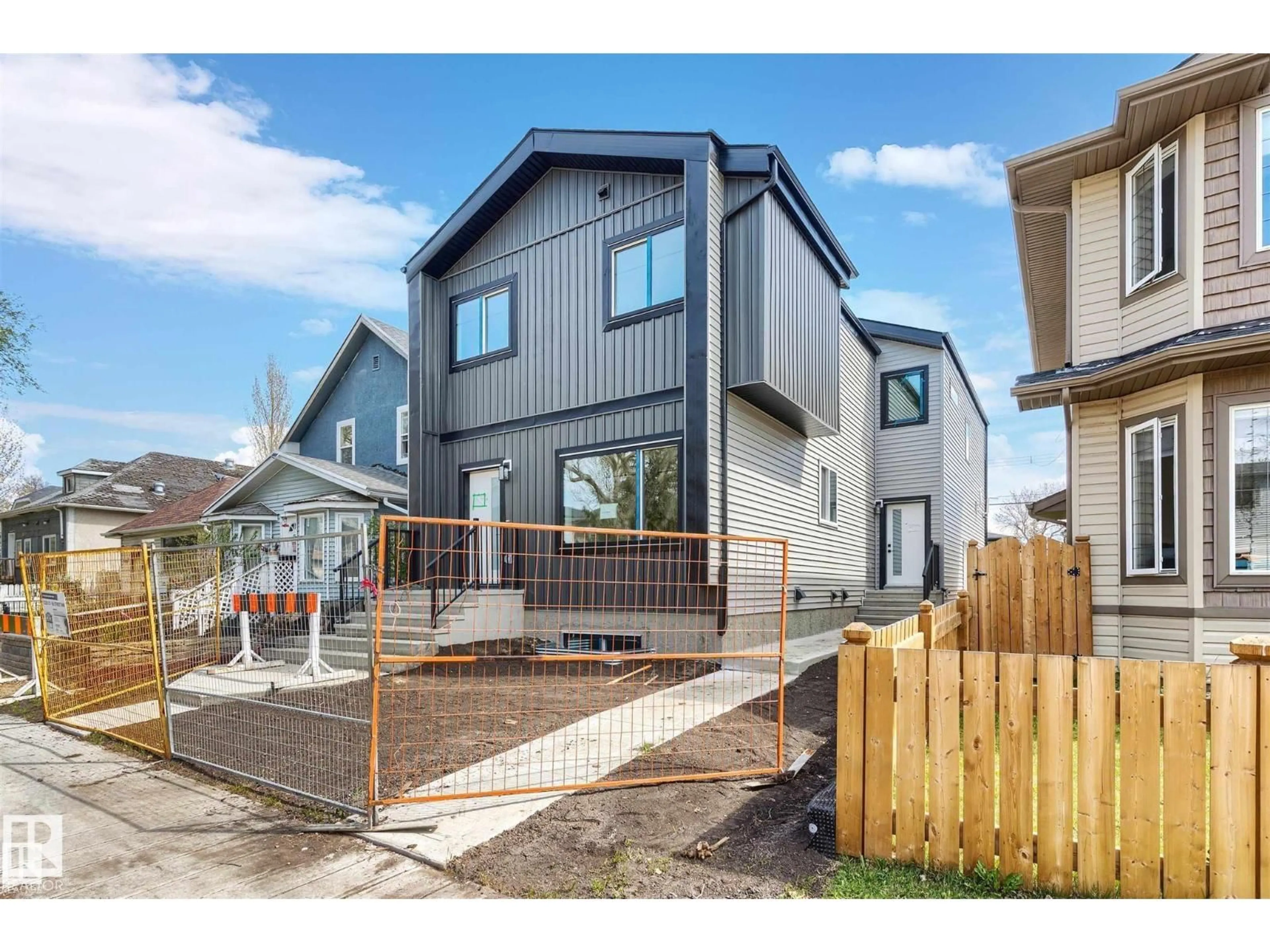Home with vinyl exterior material, street for 11229 96 STREET, Edmonton Alberta T5T1G1