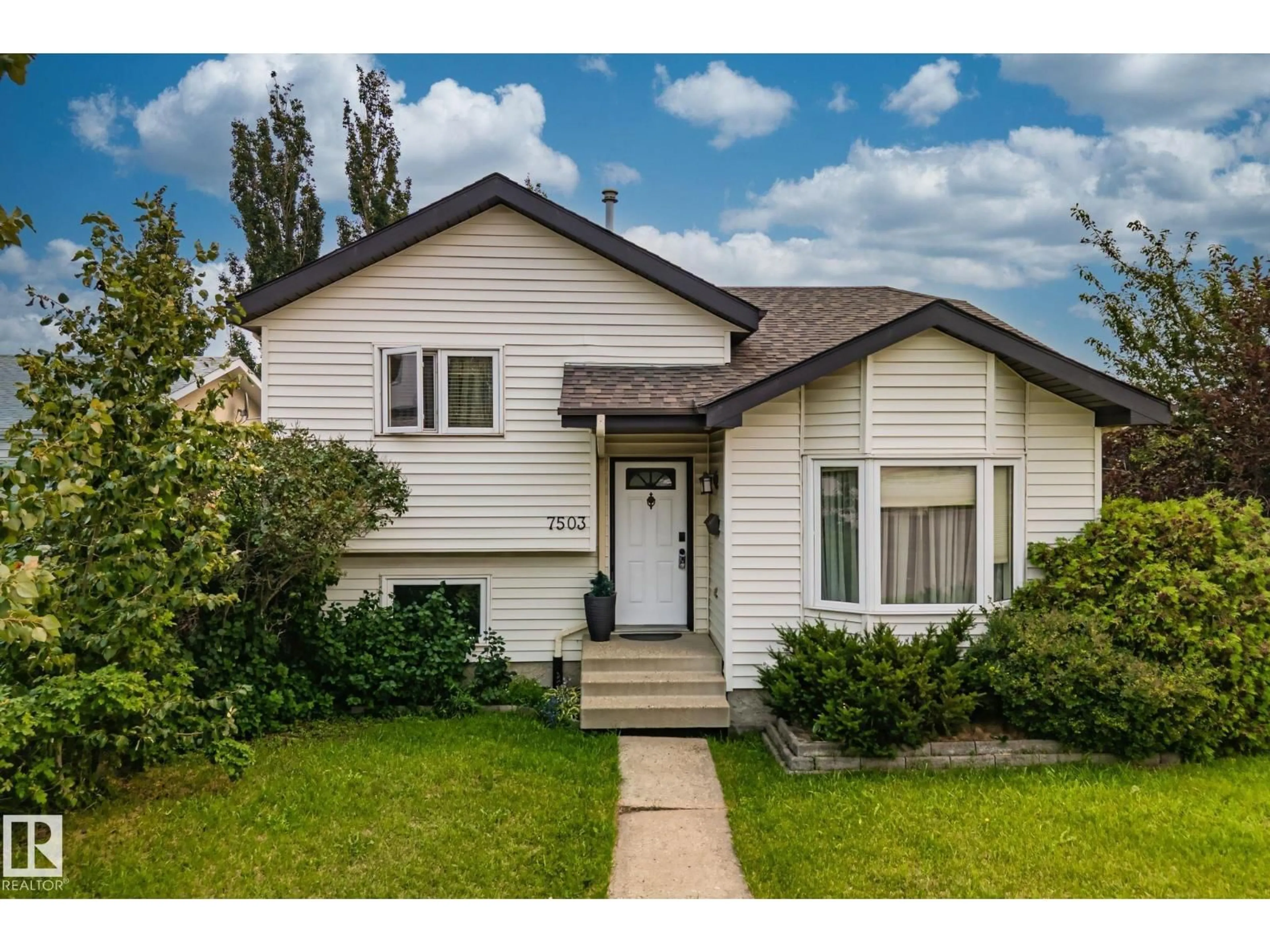 Home with vinyl exterior material, street for NW - 7503 190 ST, Edmonton Alberta T5T5H6