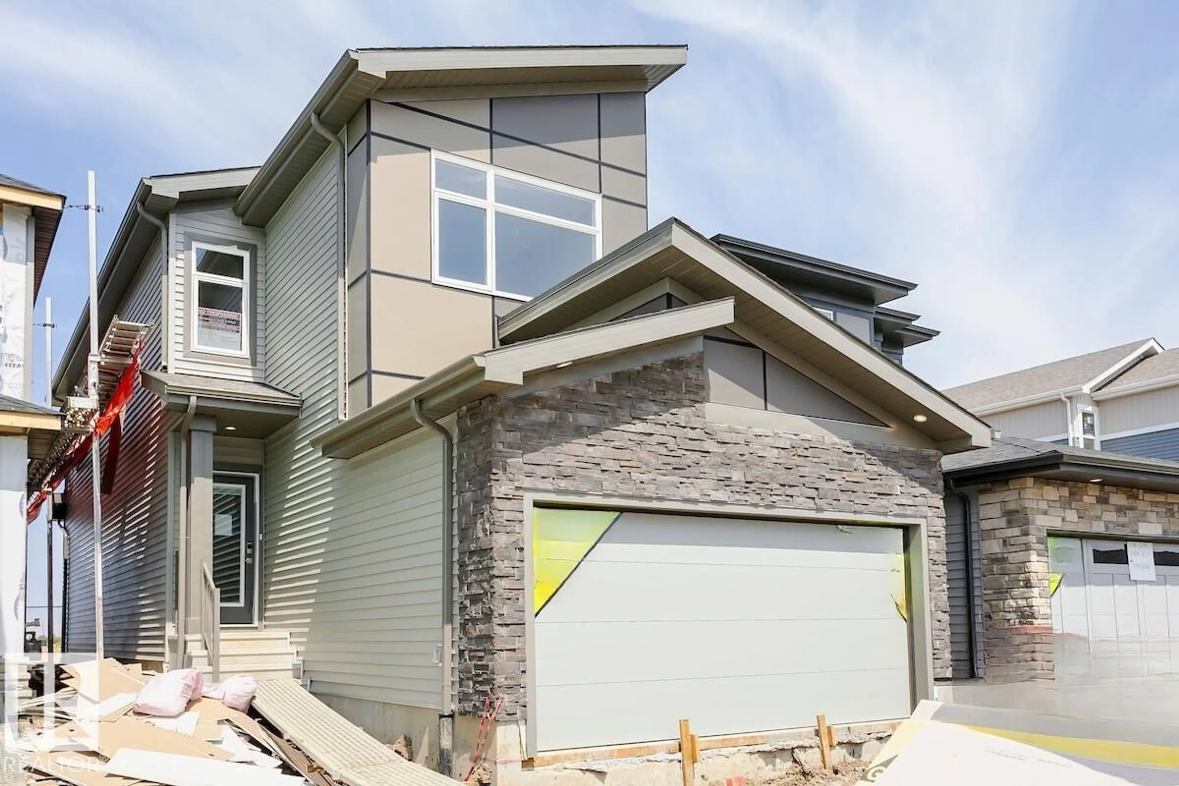 Home with vinyl exterior material, street for SW - 2815 62 ST, Edmonton Alberta T6X3G4