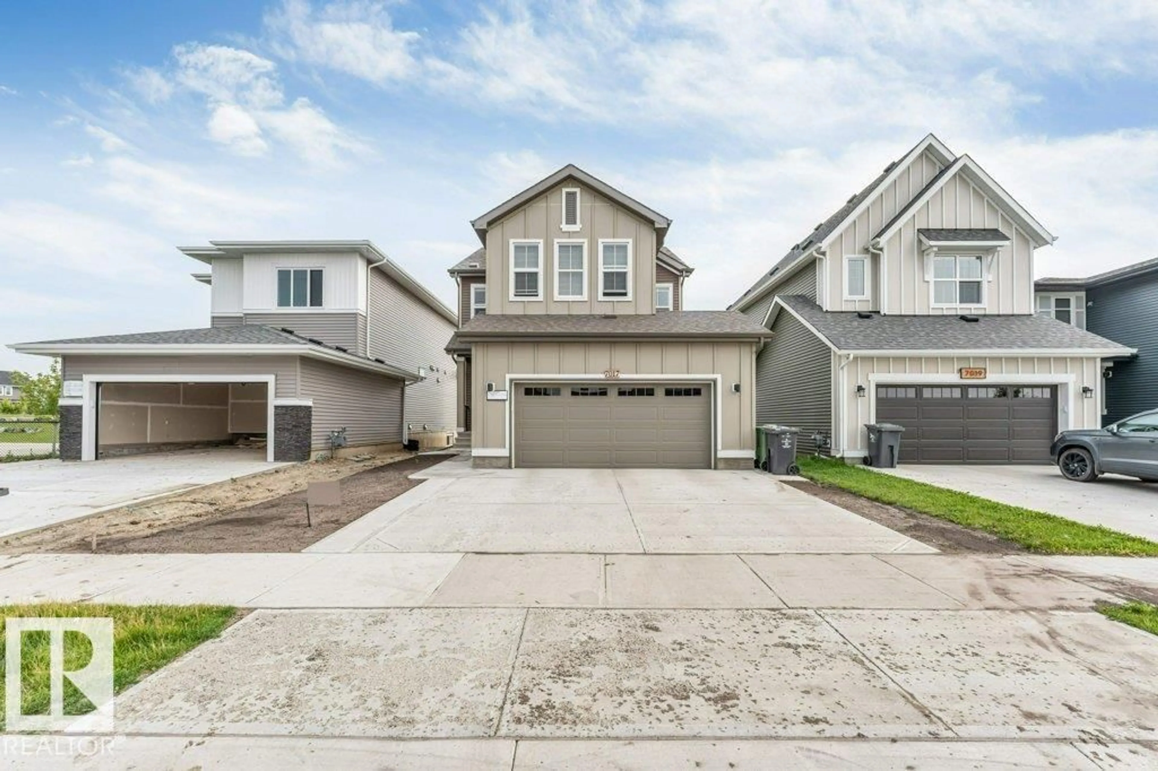 Home with vinyl exterior material, street for 7017 54 AV, Beaumont Alberta T4X2Z9