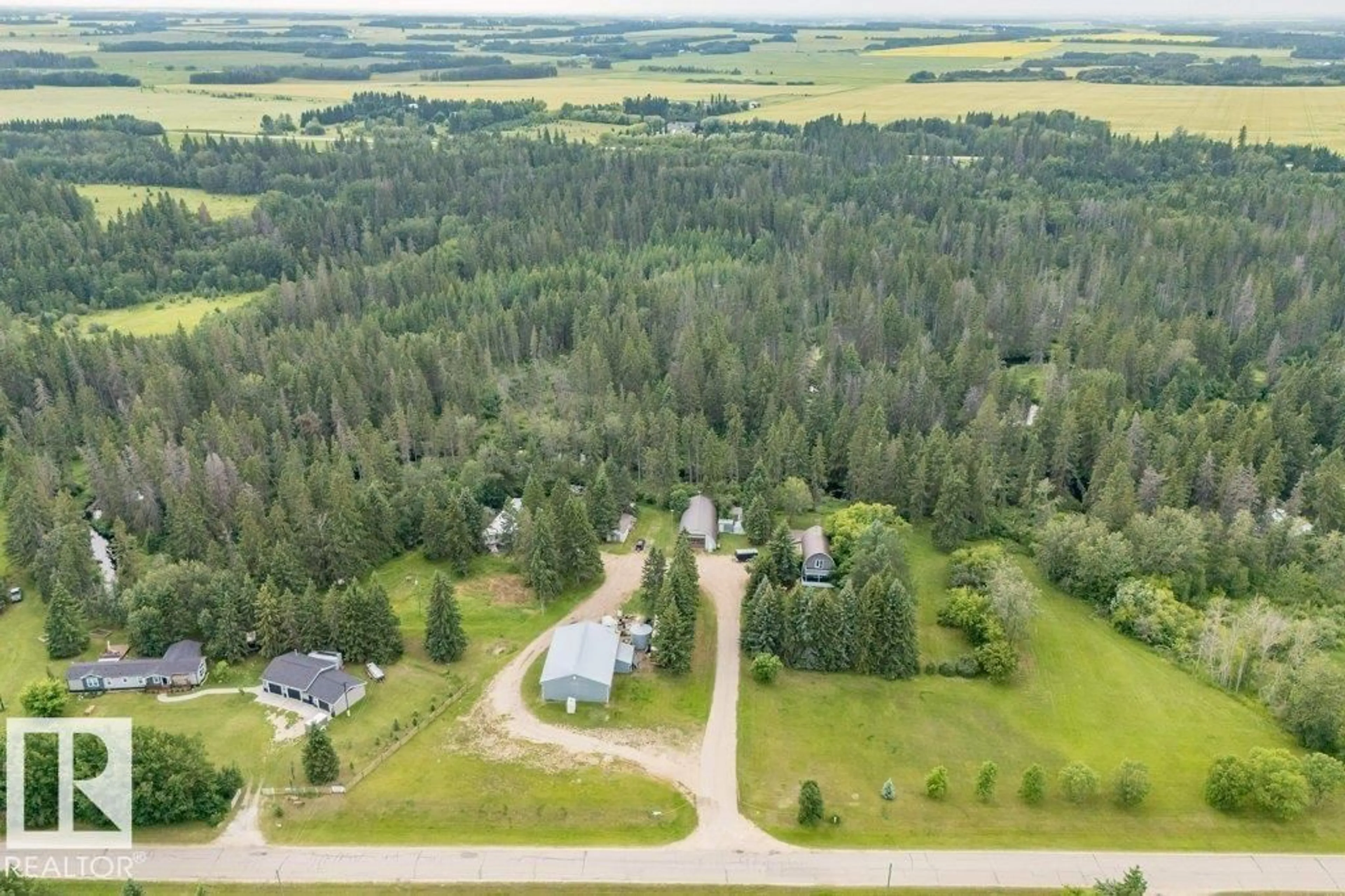A pic from outside/outdoor area/front of a property/back of a property/a pic from drone, forest/trees view for 473068 RGE ROAD 243 A, Rural Wetaskiwin County Alberta T0C1Z0