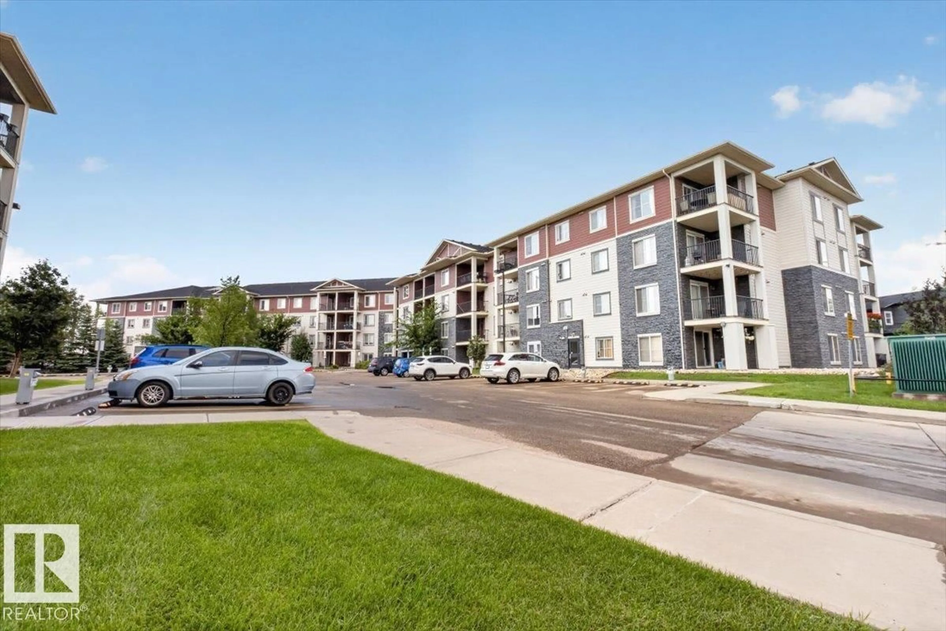 A pic from outside/outdoor area/front of a property/back of a property/a pic from drone, street for #204 - 18126 77 ST, Edmonton Alberta T5Z0N7