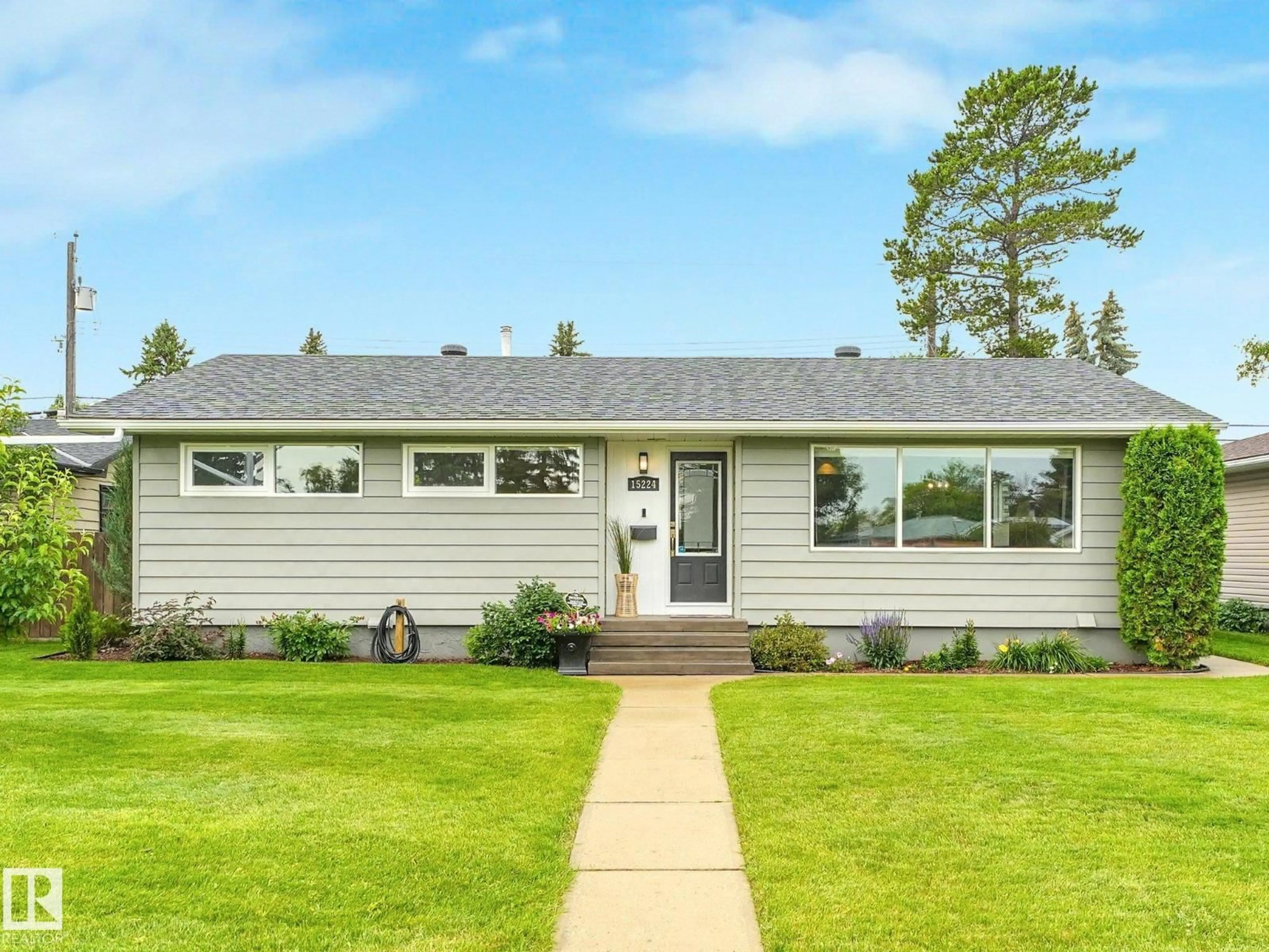 Home with vinyl exterior material, street for 15224 79A AV, Edmonton Alberta T5R3H4