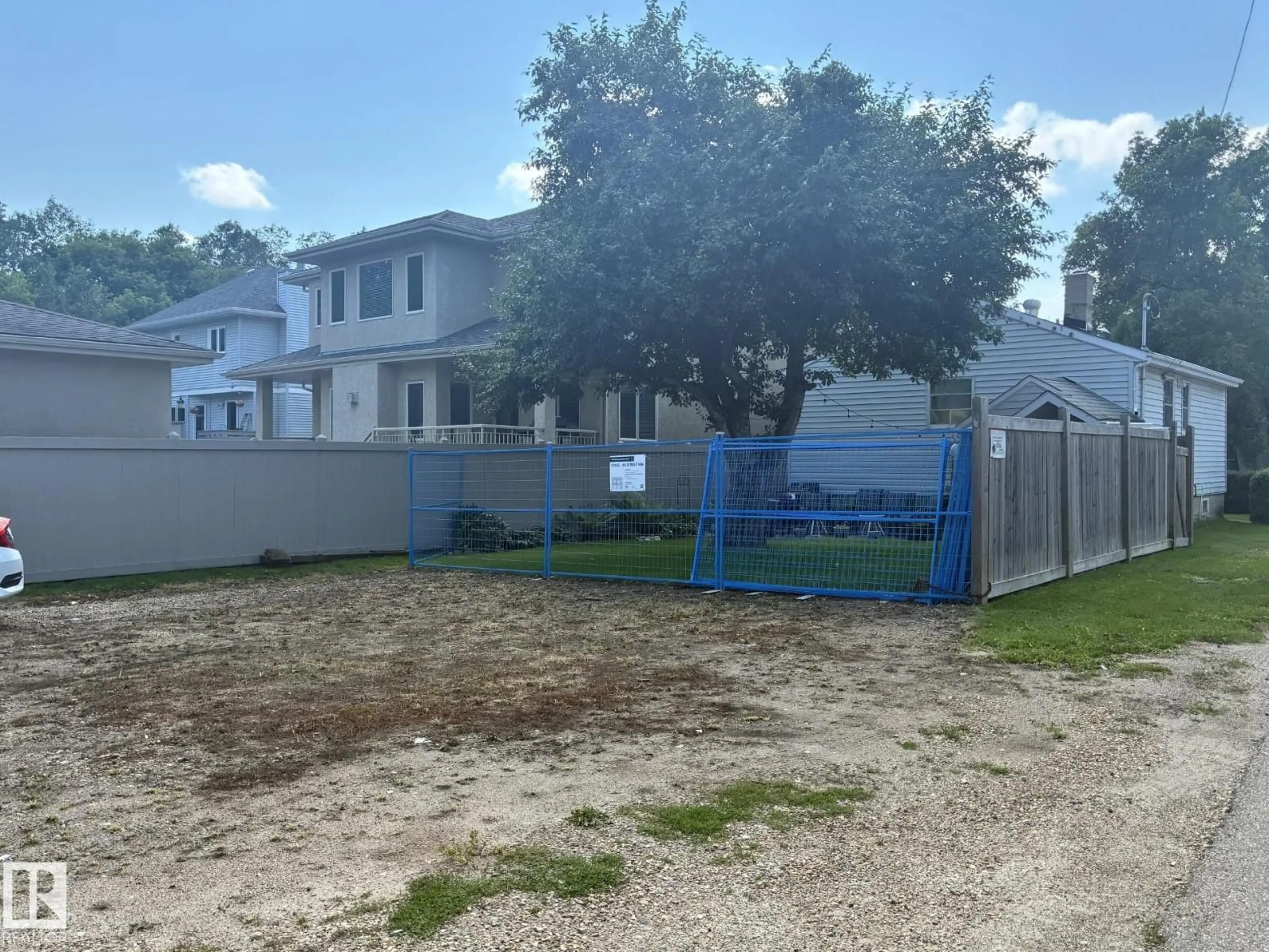 A pic from outside/outdoor area/front of a property/back of a property/a pic from drone, street for 9745 94 ST, Edmonton Alberta T6C3W1