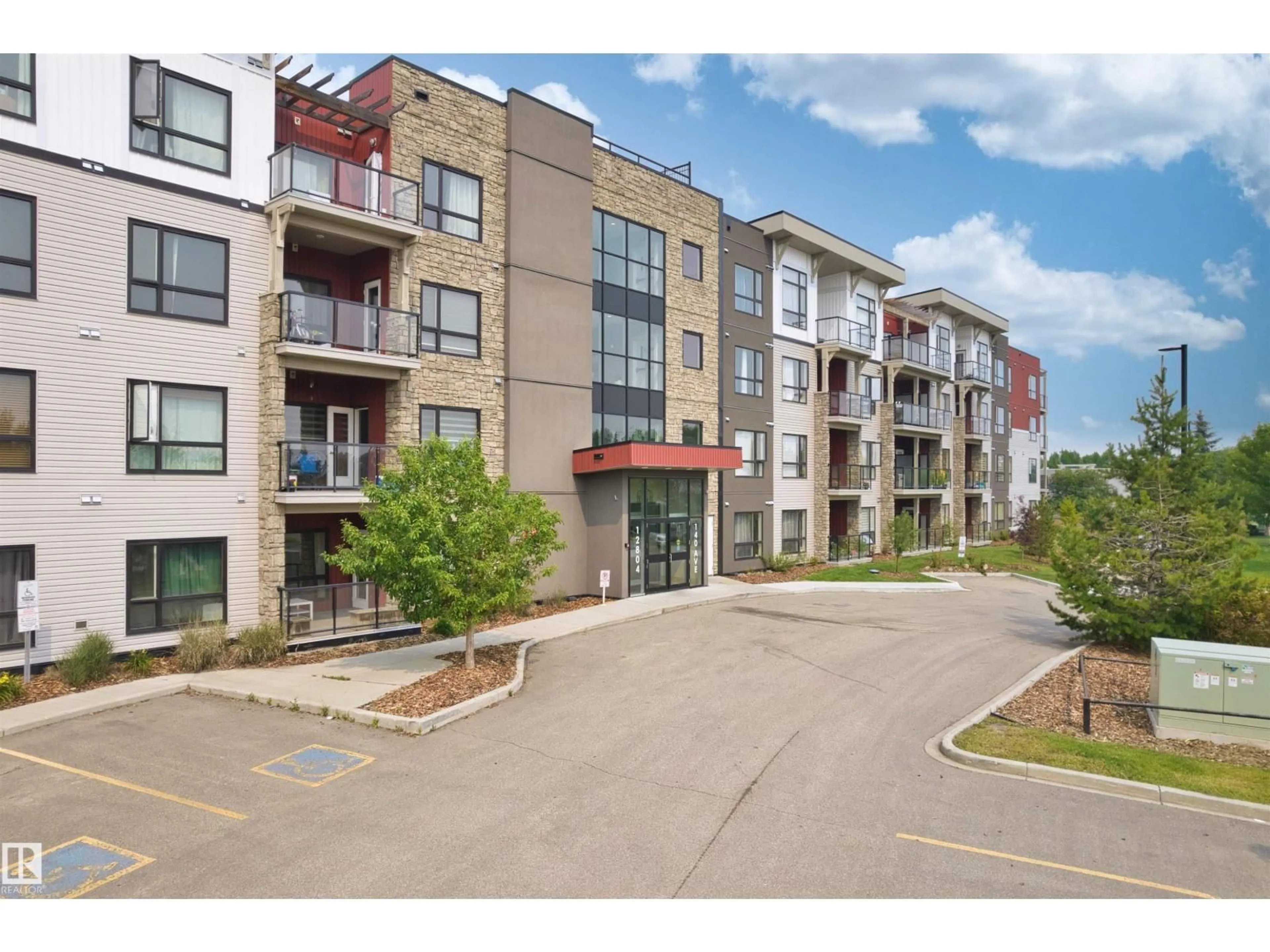 A pic from outside/outdoor area/front of a property/back of a property/a pic from drone, unknown for 115 12804 140 AV NW, Edmonton Alberta T6V0M3