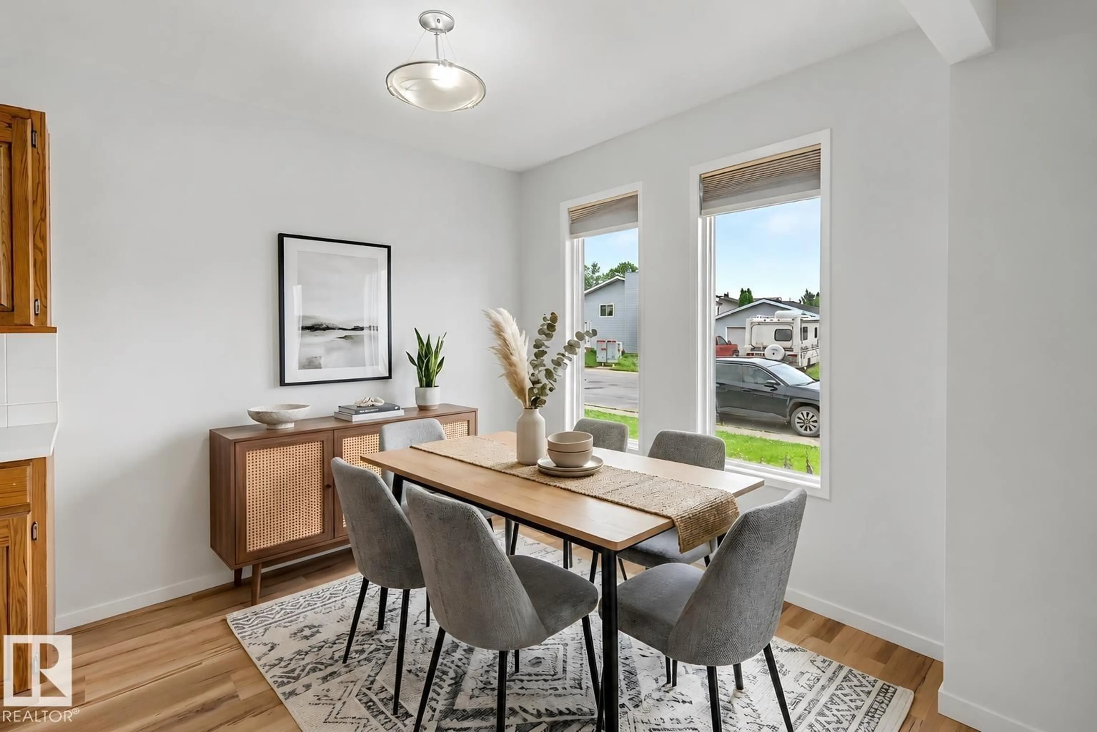 Dining room, wood/laminate floor for 312 LAGO LINDO CR, Edmonton Alberta T5Z1Y9