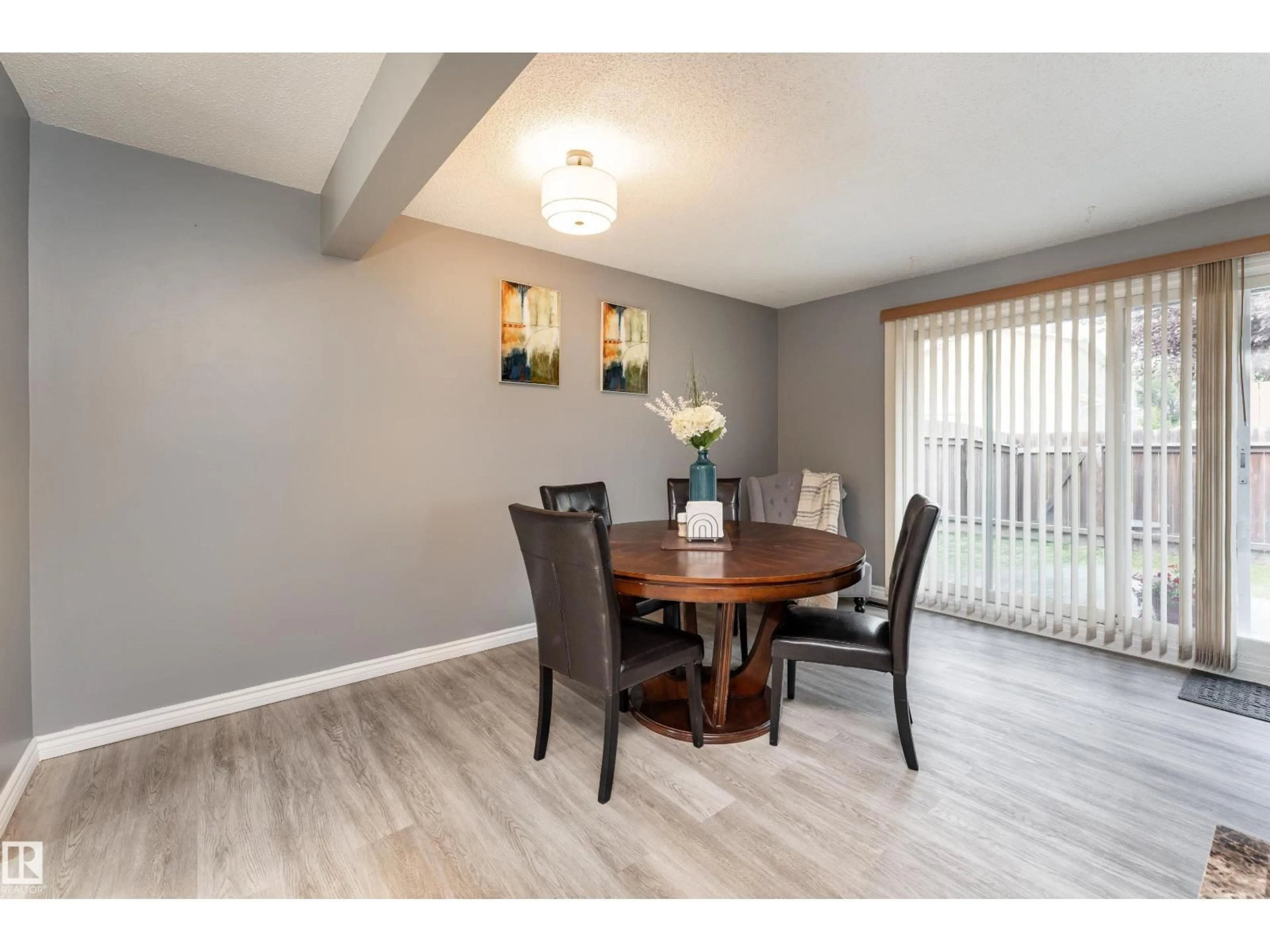 Dining room, wood/laminate floor for NW - 6352 180 ST, Edmonton Alberta T5T2J6