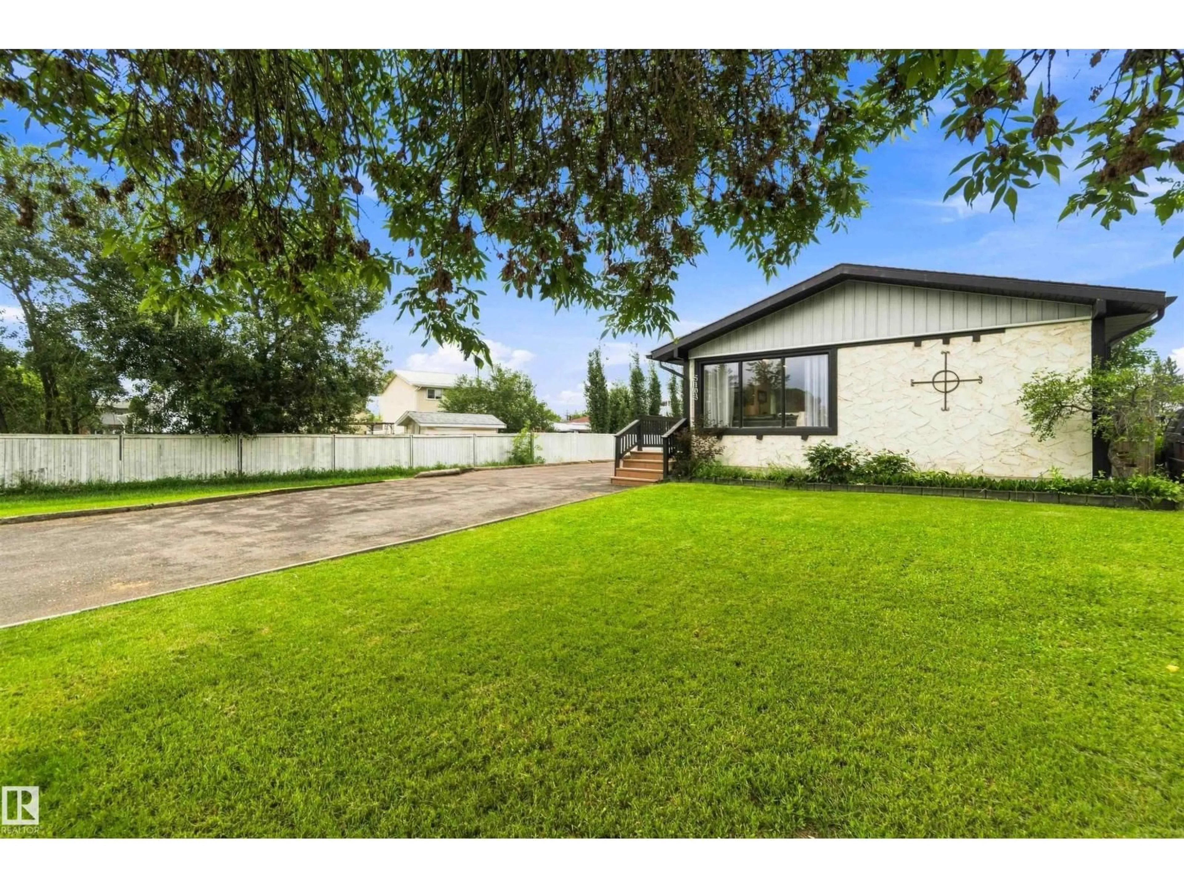 A pic from outside/outdoor area/front of a property/back of a property/a pic from drone, street for 5103 57 AV, Leduc Alberta T9E5S7