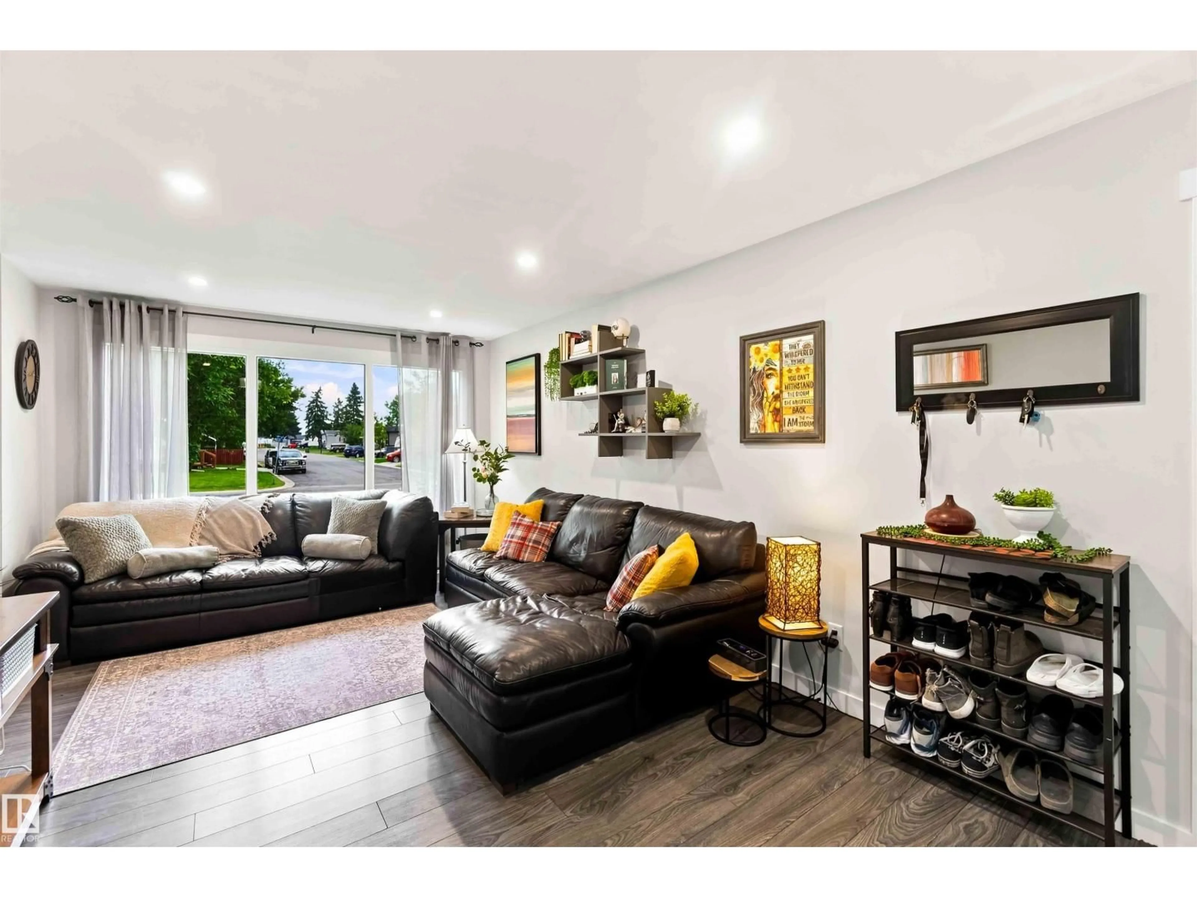 Living room with furniture, unknown for 5103 57 AV, Leduc Alberta T9E5S7