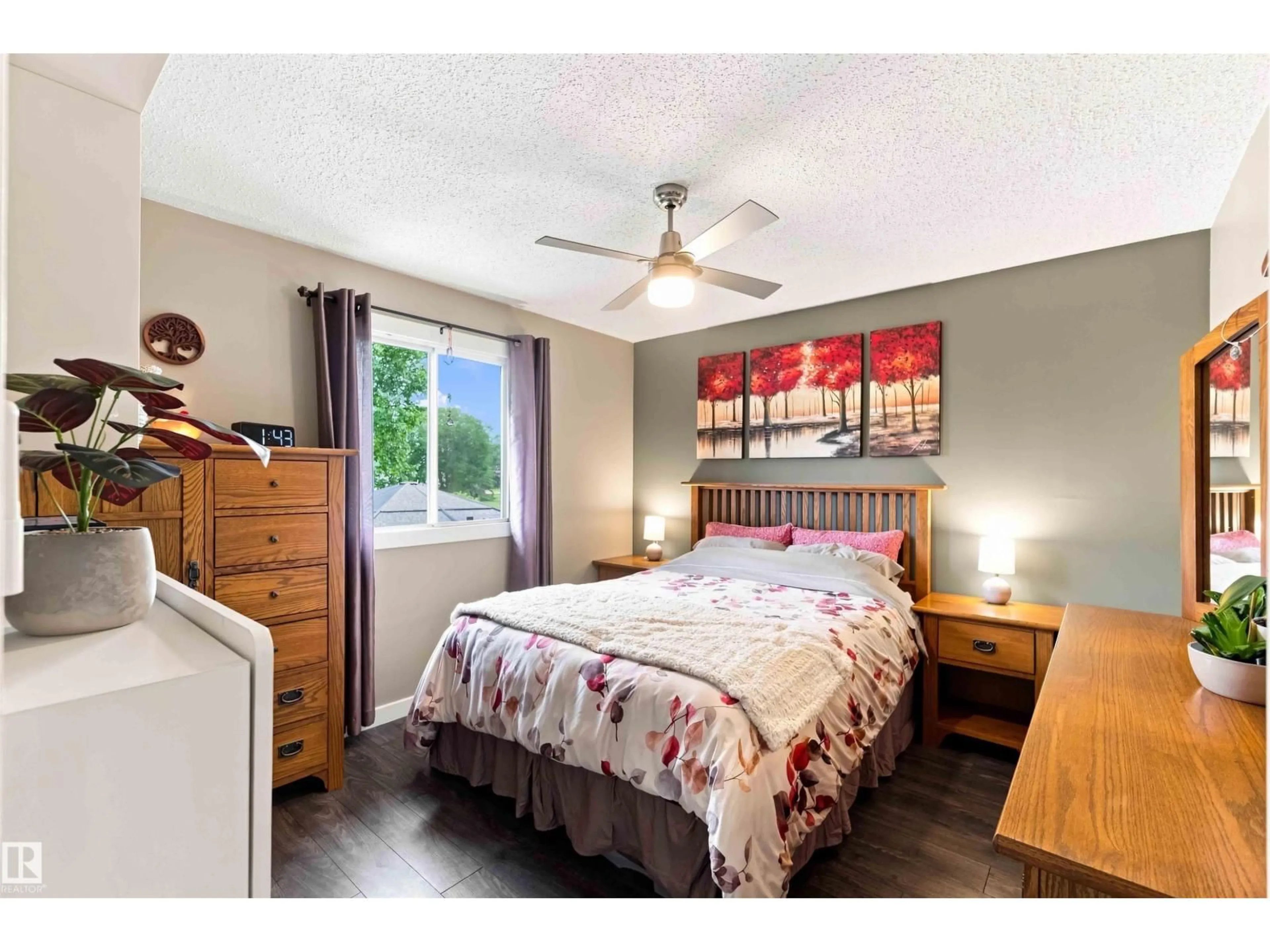 Bedroom with bed, wood/laminate floor for 5103 57 AV, Leduc Alberta T9E5S7