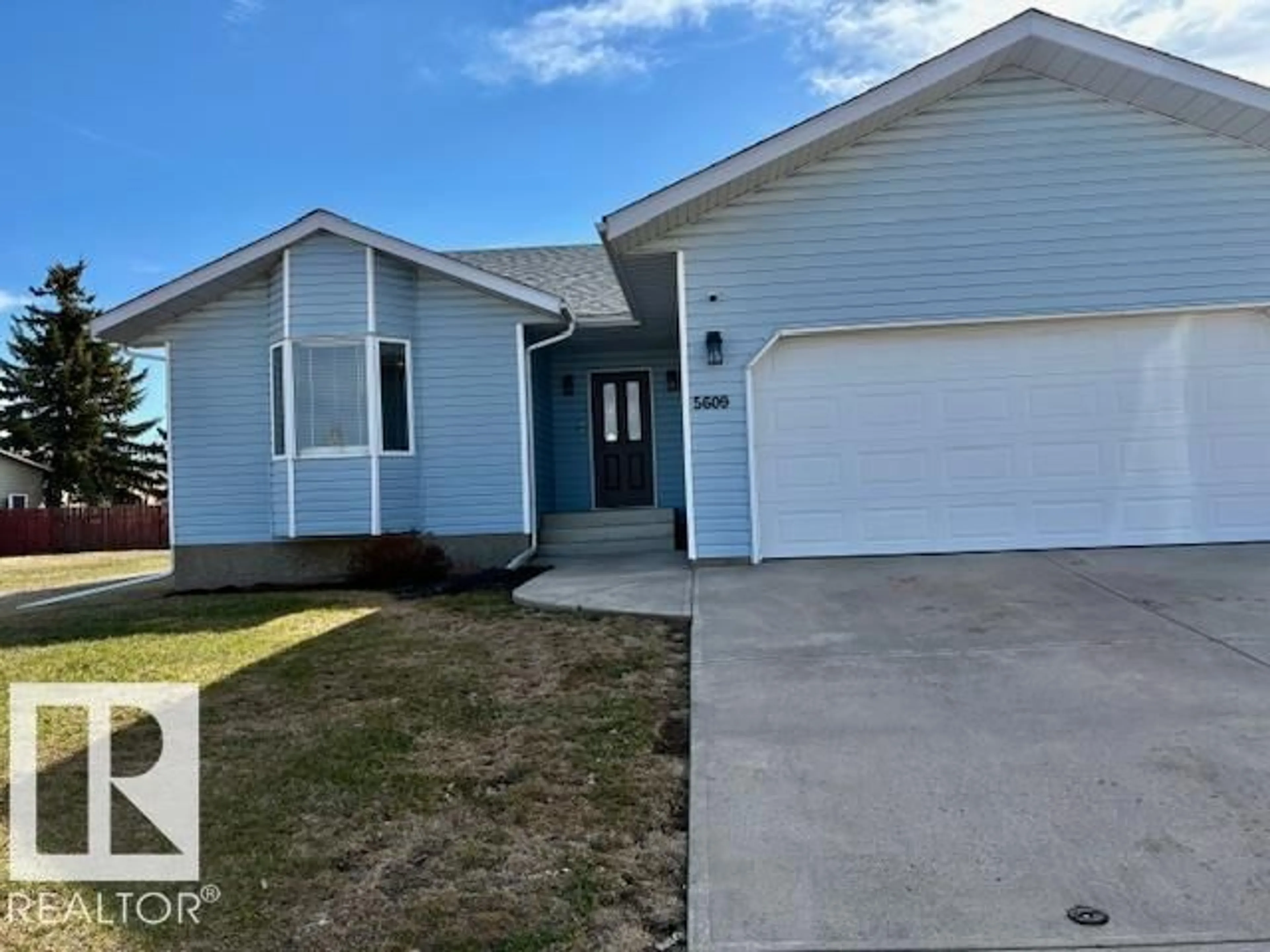 Home with vinyl exterior material, street for 5609 45A ST, Vegreville Alberta T9C1E1