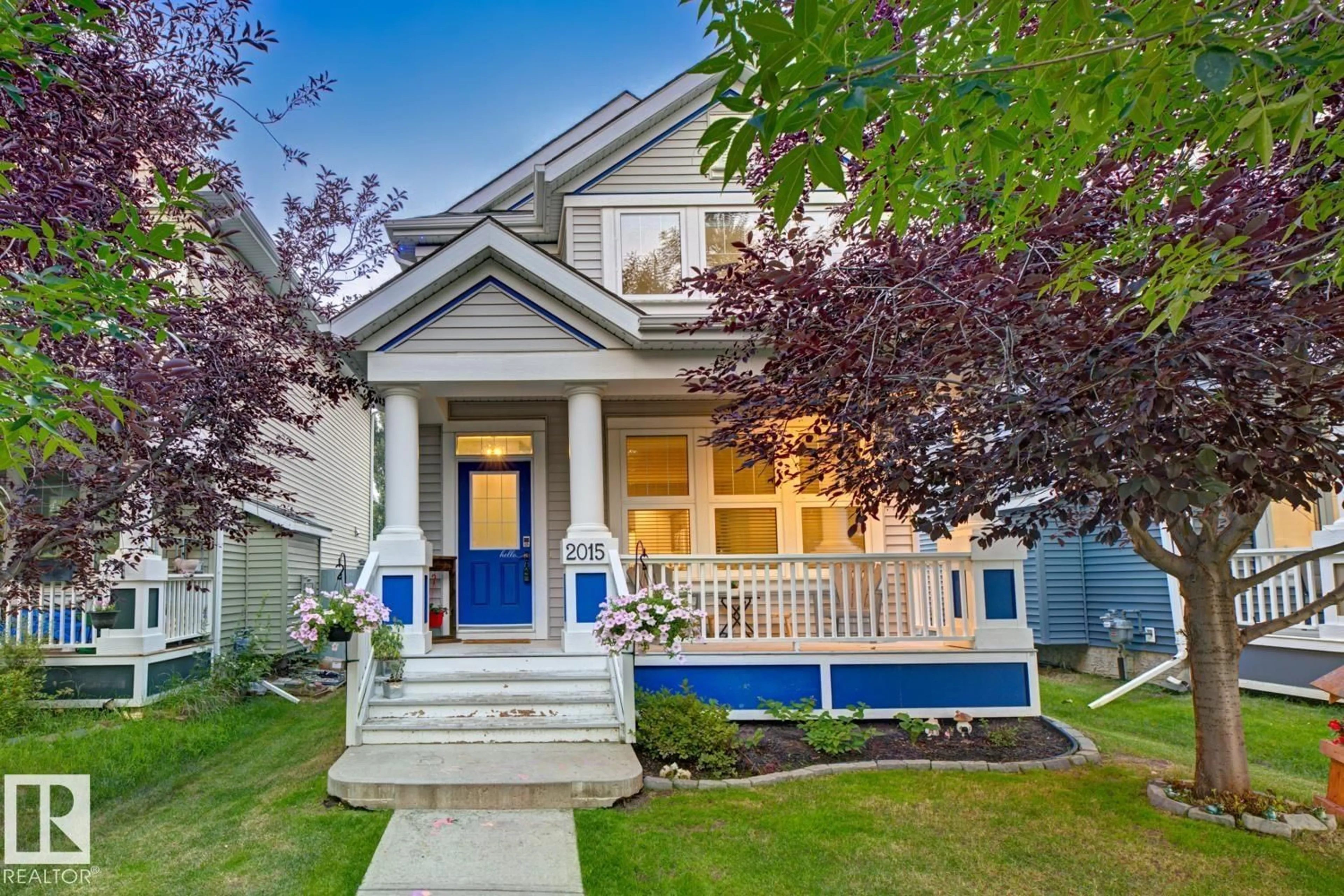 Home with vinyl exterior material, street for SW - 2015 74 ST, Edmonton Alberta T6X0V7