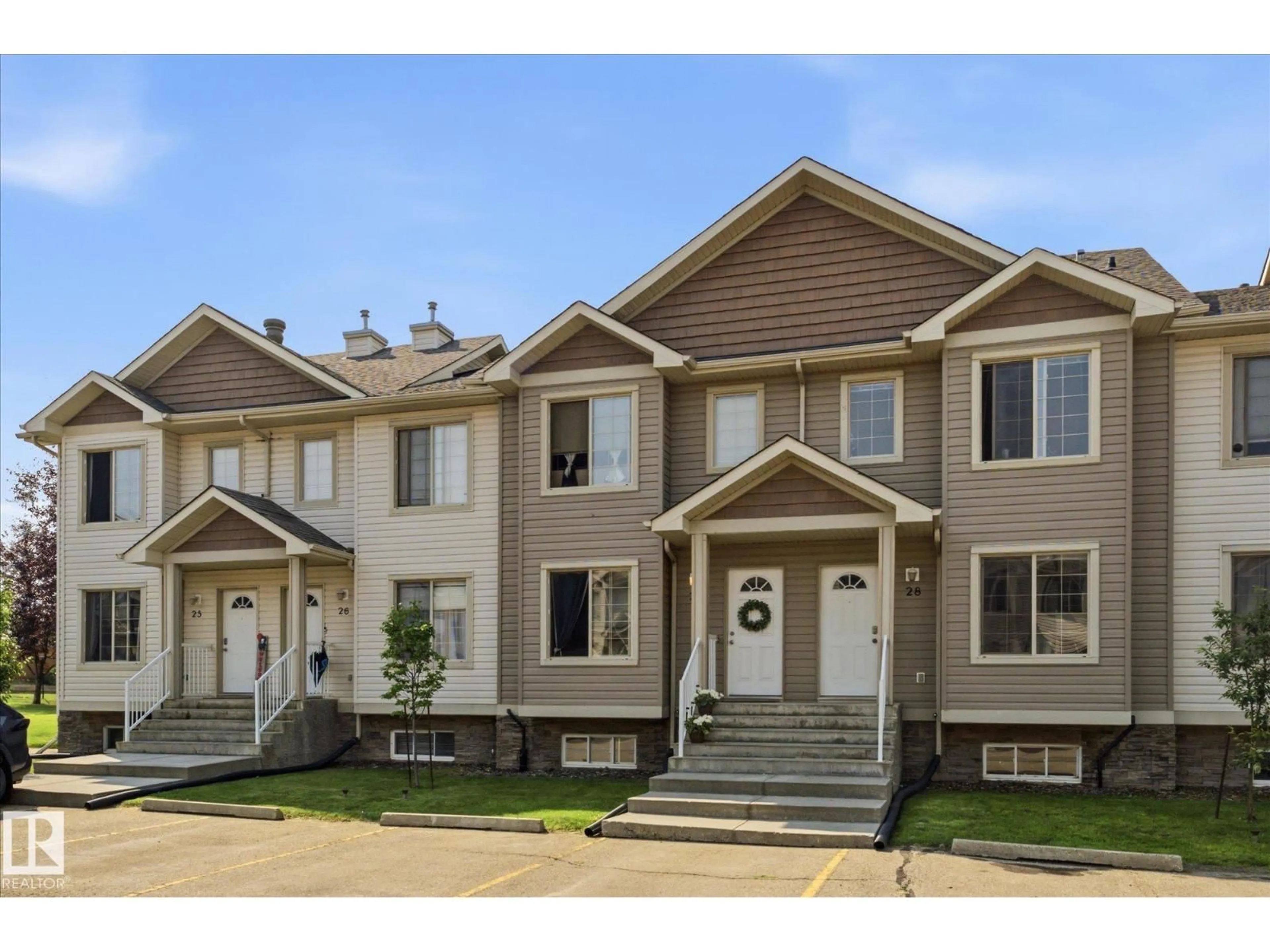 Home with vinyl exterior material, street for 27 290 SPRUCE RIDGE RD, Spruce Grove Alberta T7X0C4