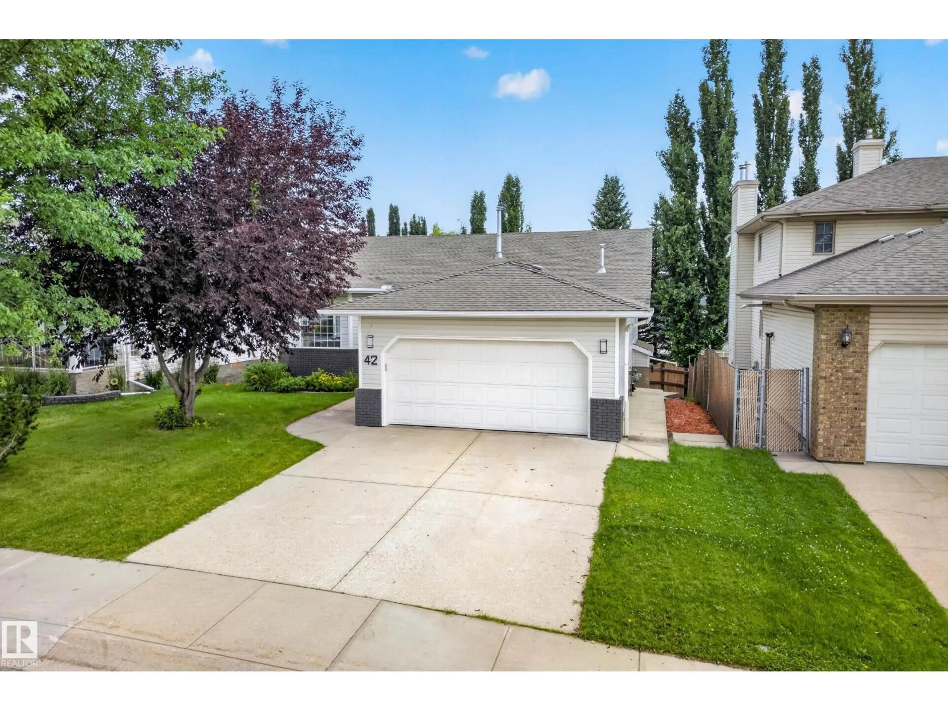 Home with vinyl exterior material, street for 42 CHARLTON CR, Sherwood Park Alberta T8H1S1