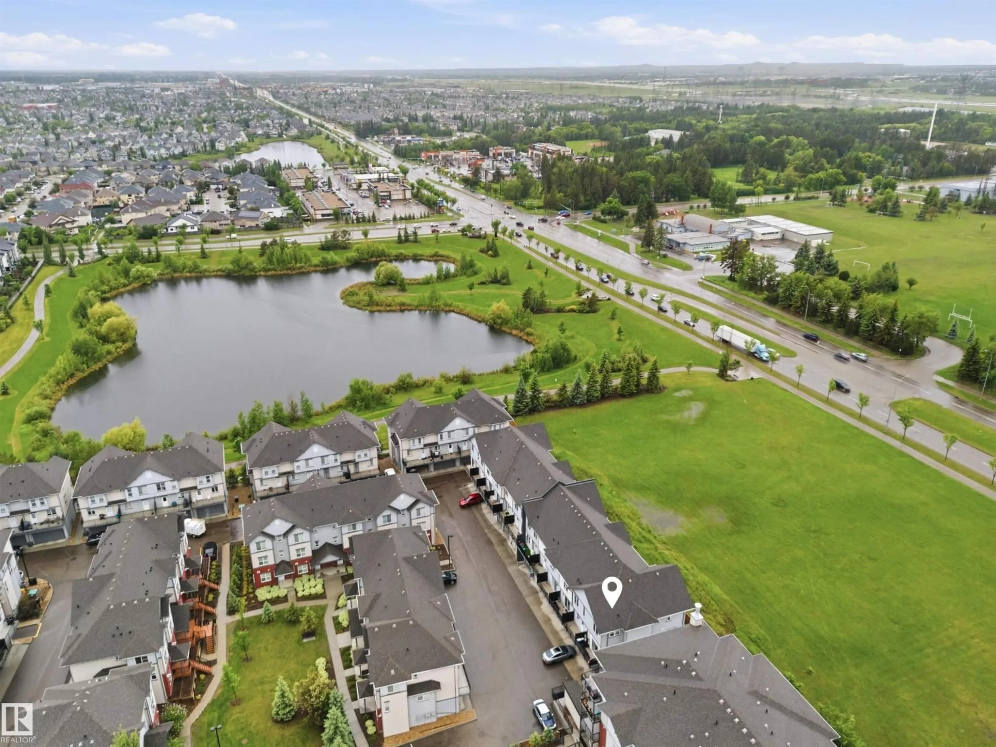 A pic from outside/outdoor area/front of a property/back of a property/a pic from drone, water/lake/river/ocean view for 655 - 64 WATT BV, Edmonton Alberta T6X0Y2