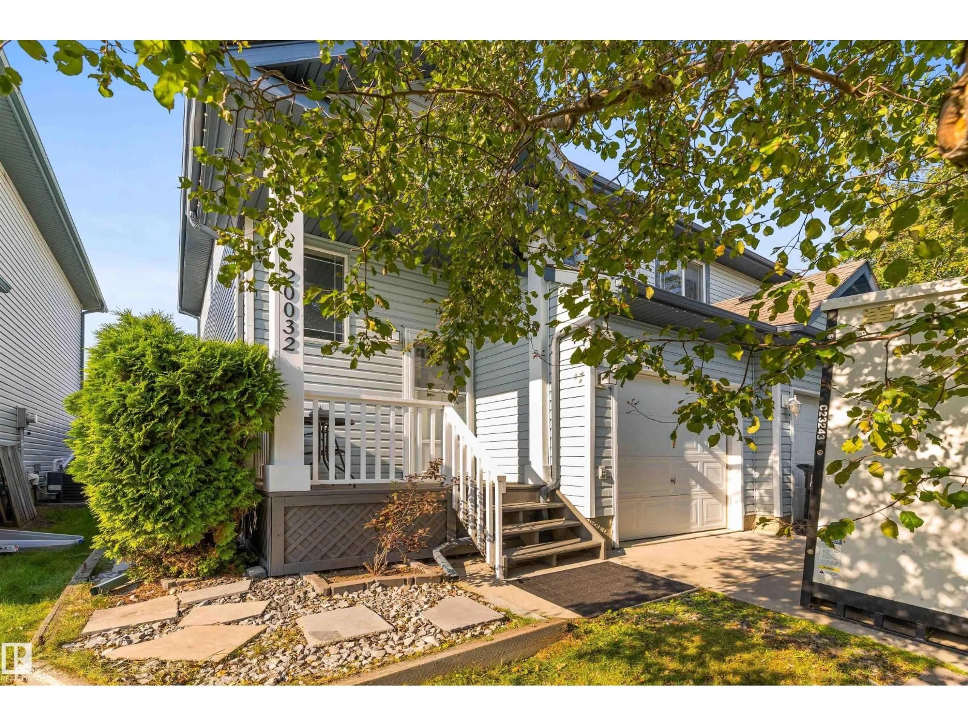 Home with vinyl exterior material, street for 20032 53A AV, Edmonton Alberta T6M2W4