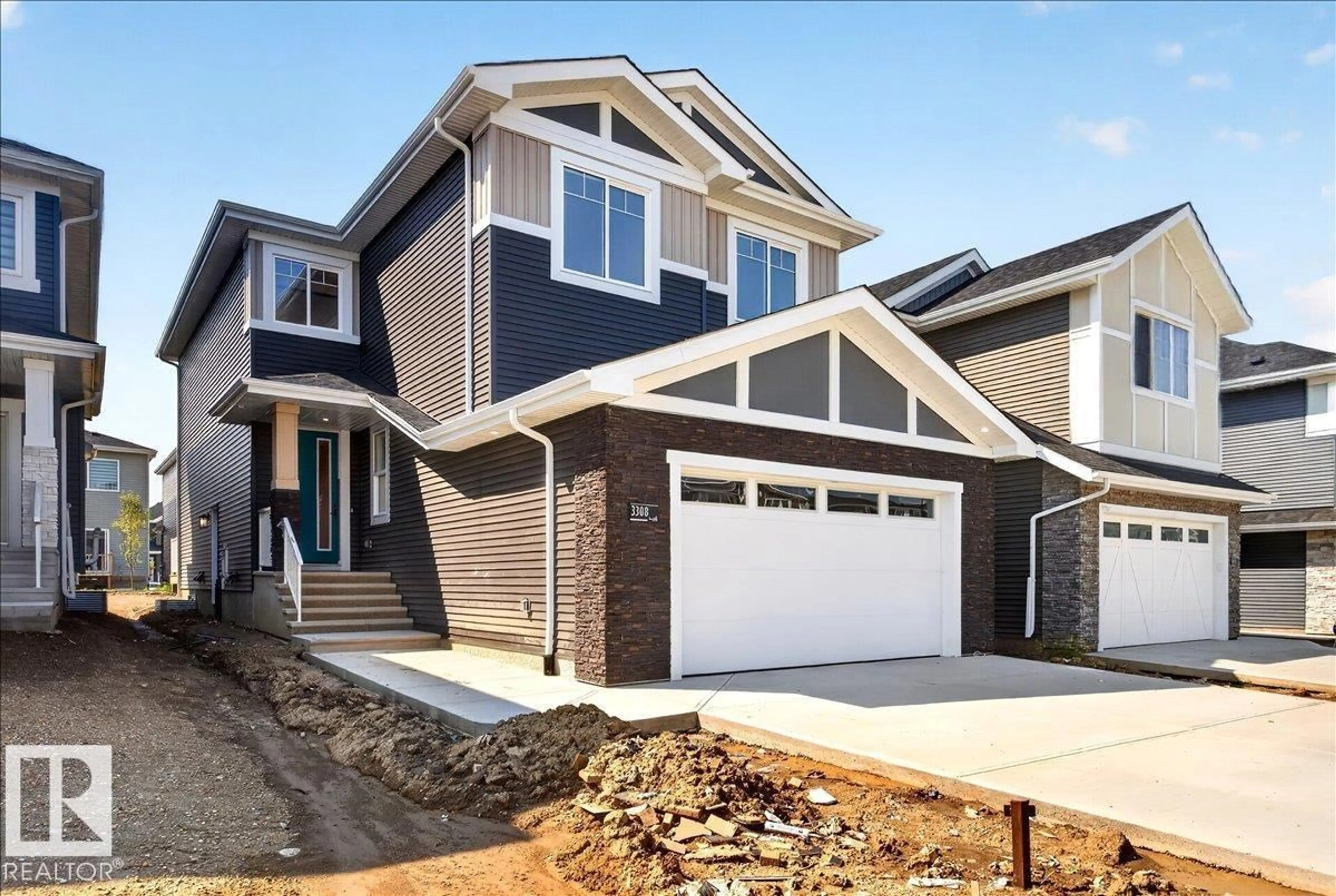 Home with vinyl exterior material, street for 3308 CHICKADEE DR, Edmonton Alberta T5S0V5