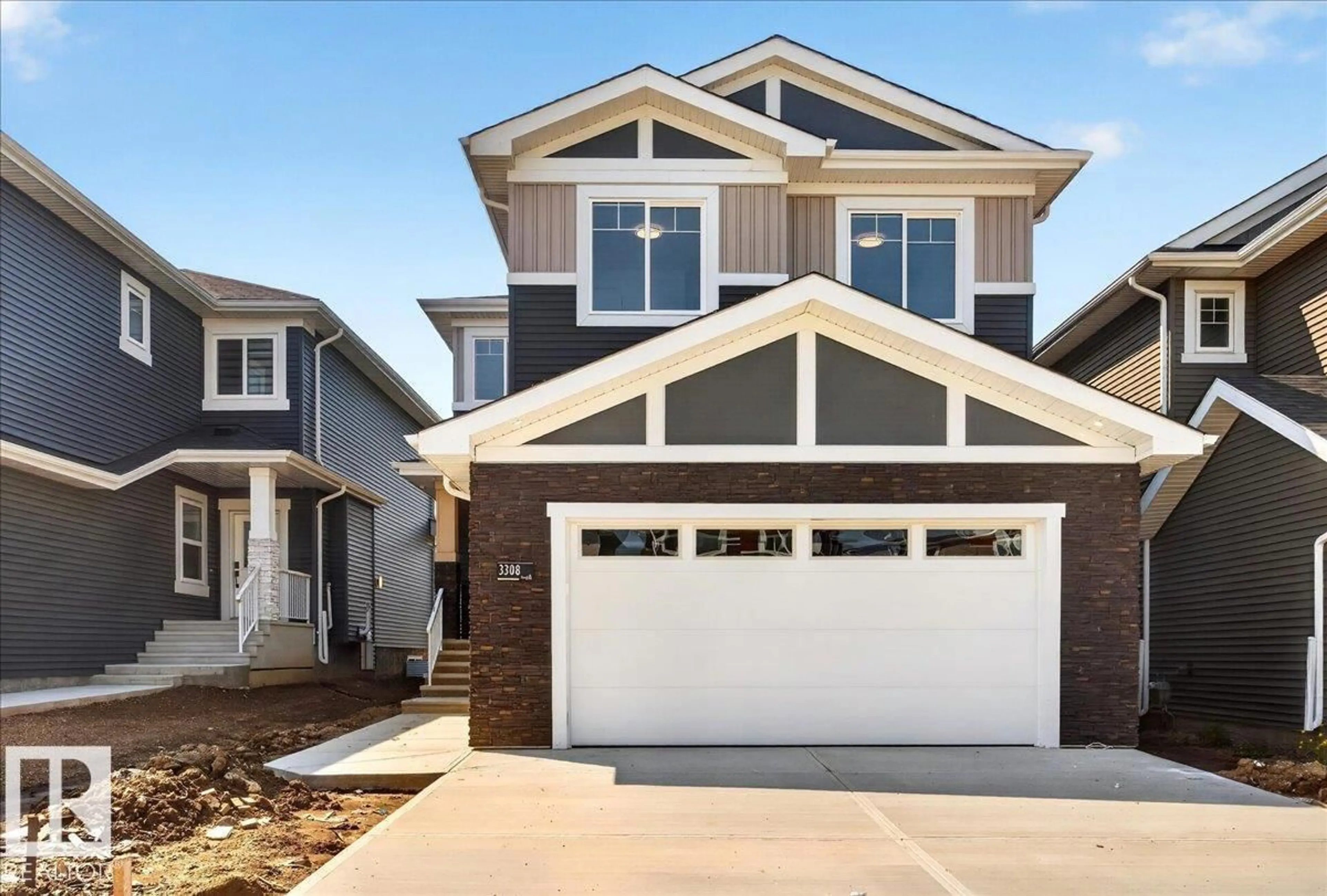 Home with vinyl exterior material, street for 3308 CHICKADEE DR, Edmonton Alberta T5S0V5