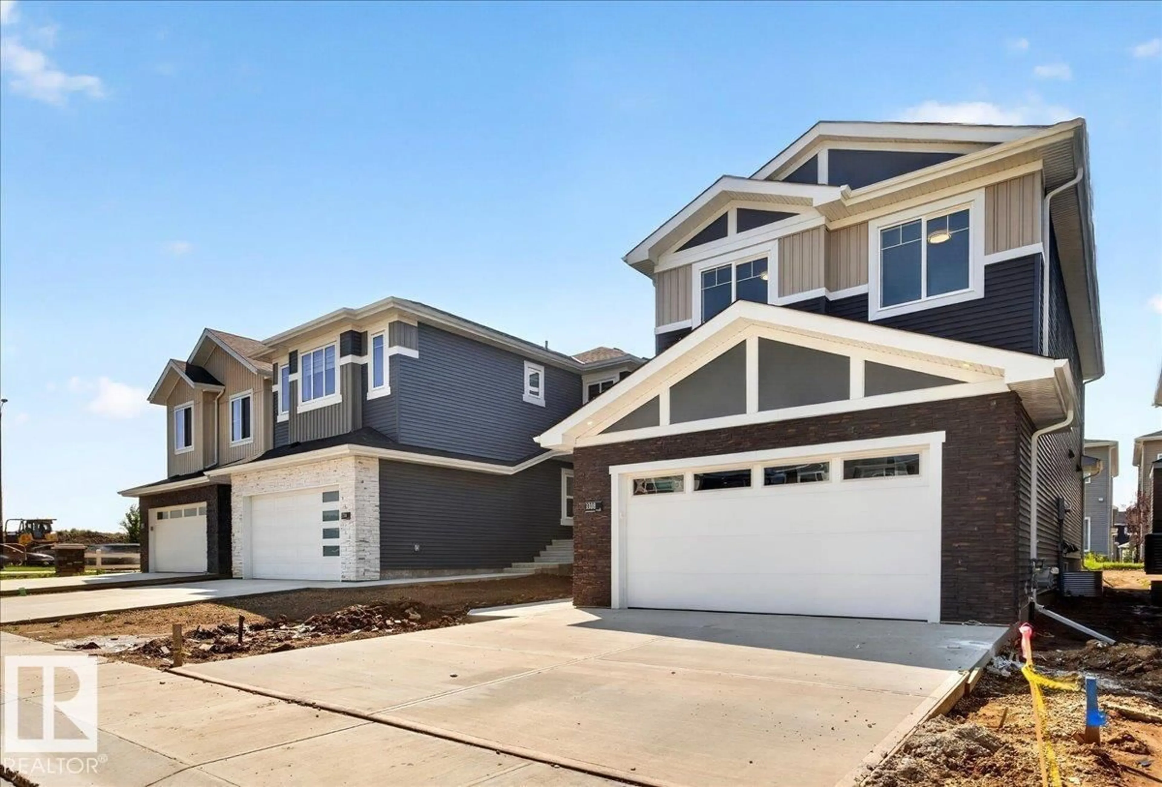 Home with vinyl exterior material, street for 3308 CHICKADEE DR, Edmonton Alberta T5S0V5