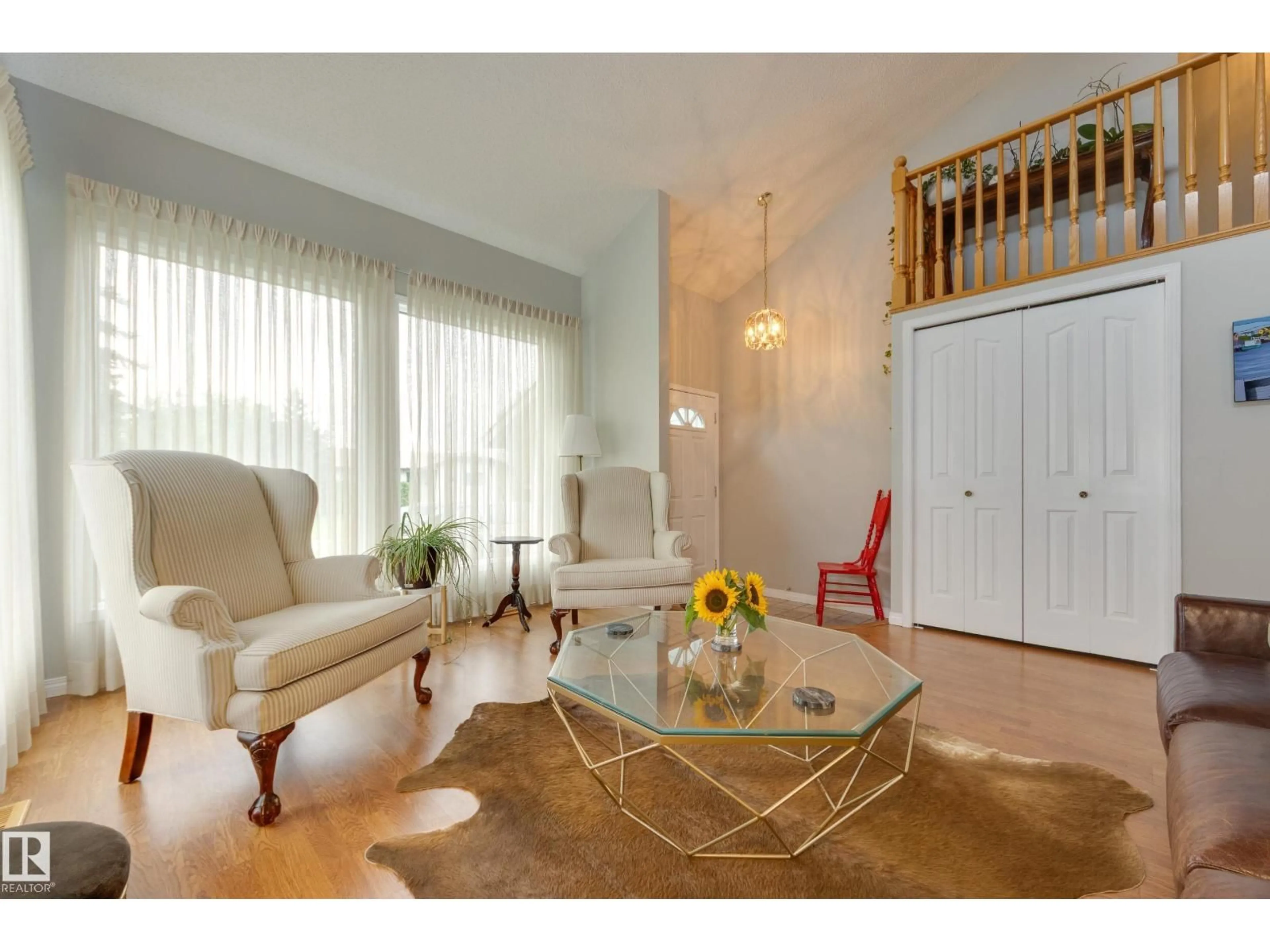 Living room with furniture, unknown for NW - 6212 179 ST, Edmonton Alberta T5T4E4