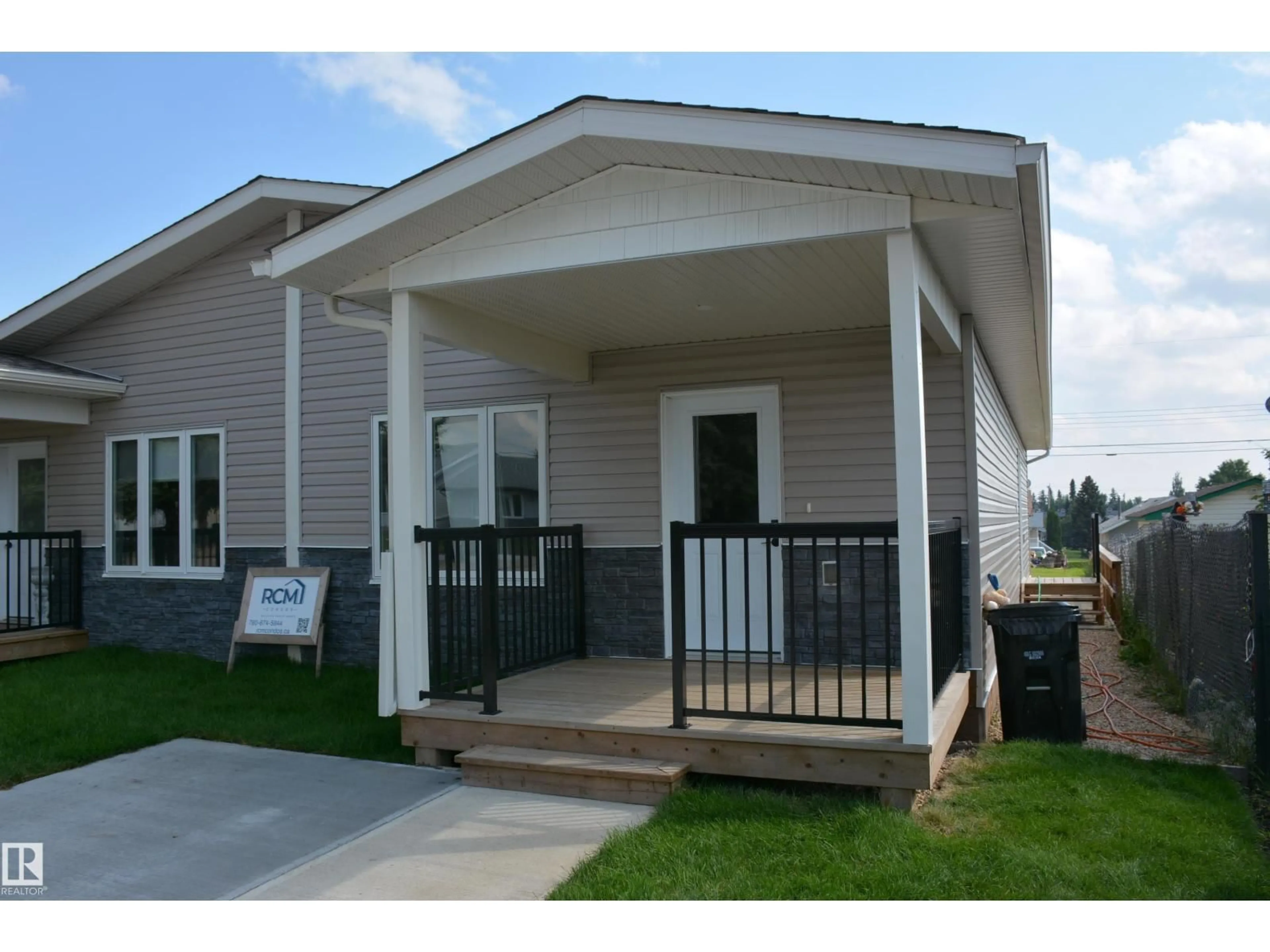 Home with vinyl exterior material, street for 4313 54 AV, Barrhead Alberta T7N1J8