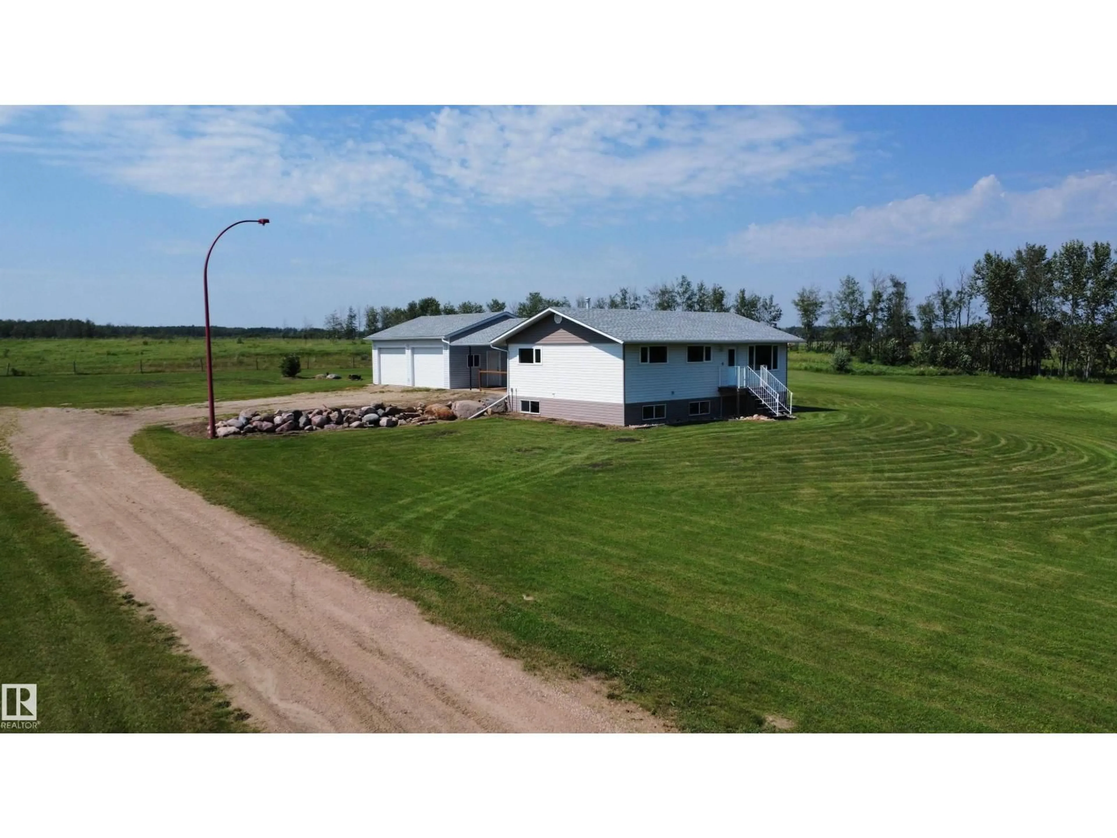 A pic from outside/outdoor area/front of a property/back of a property/a pic from drone, building for 58514 RG RD 243, Rural Westlock County Alberta T0G2J0