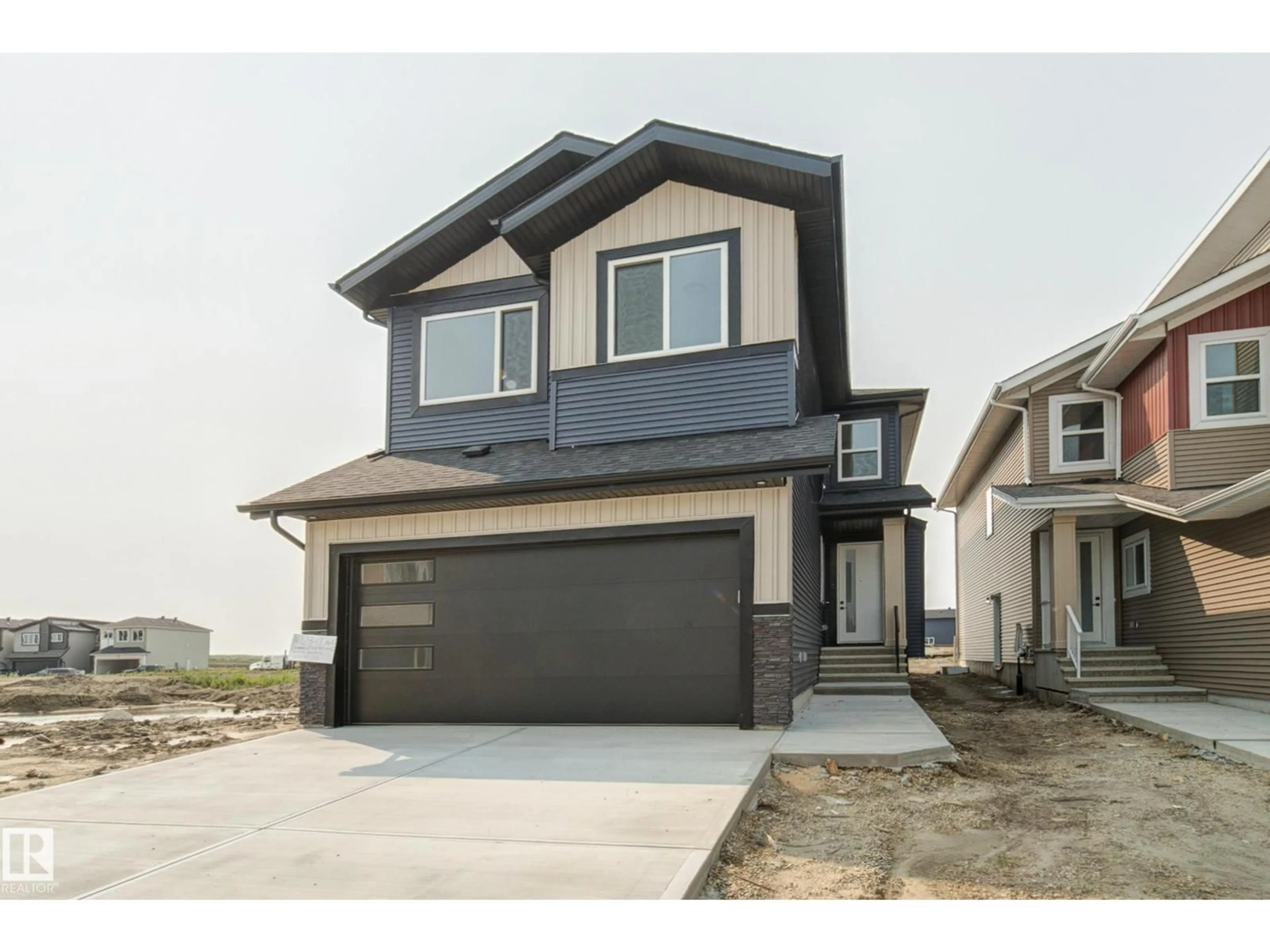 Home with vinyl exterior material, street for 4723 17 AV, Edmonton Alberta T6X0P6