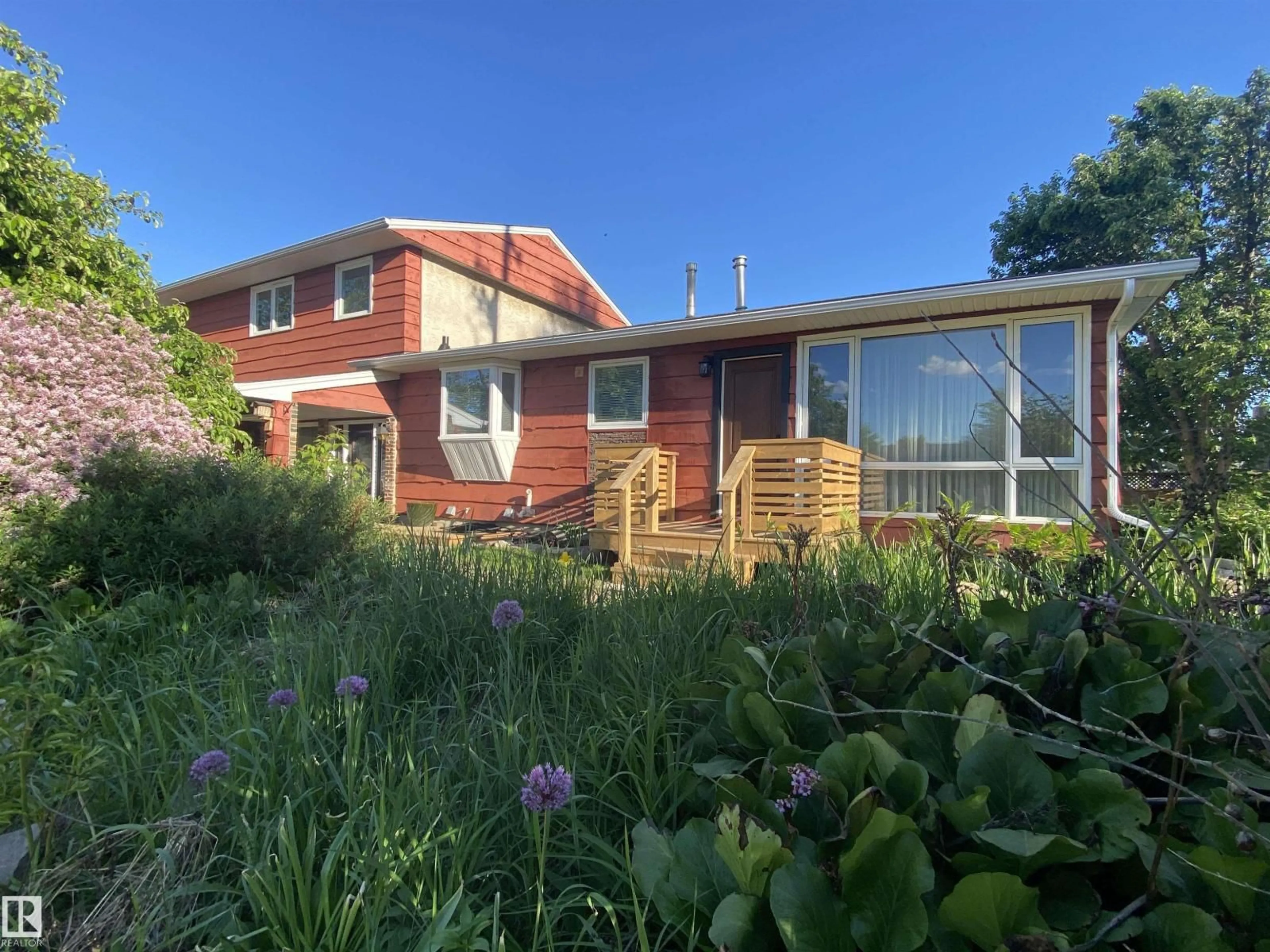 A pic from outside/outdoor area/front of a property/back of a property/a pic from drone, unknown for NW - 12137 50 ST, Edmonton Alberta T5W3C6