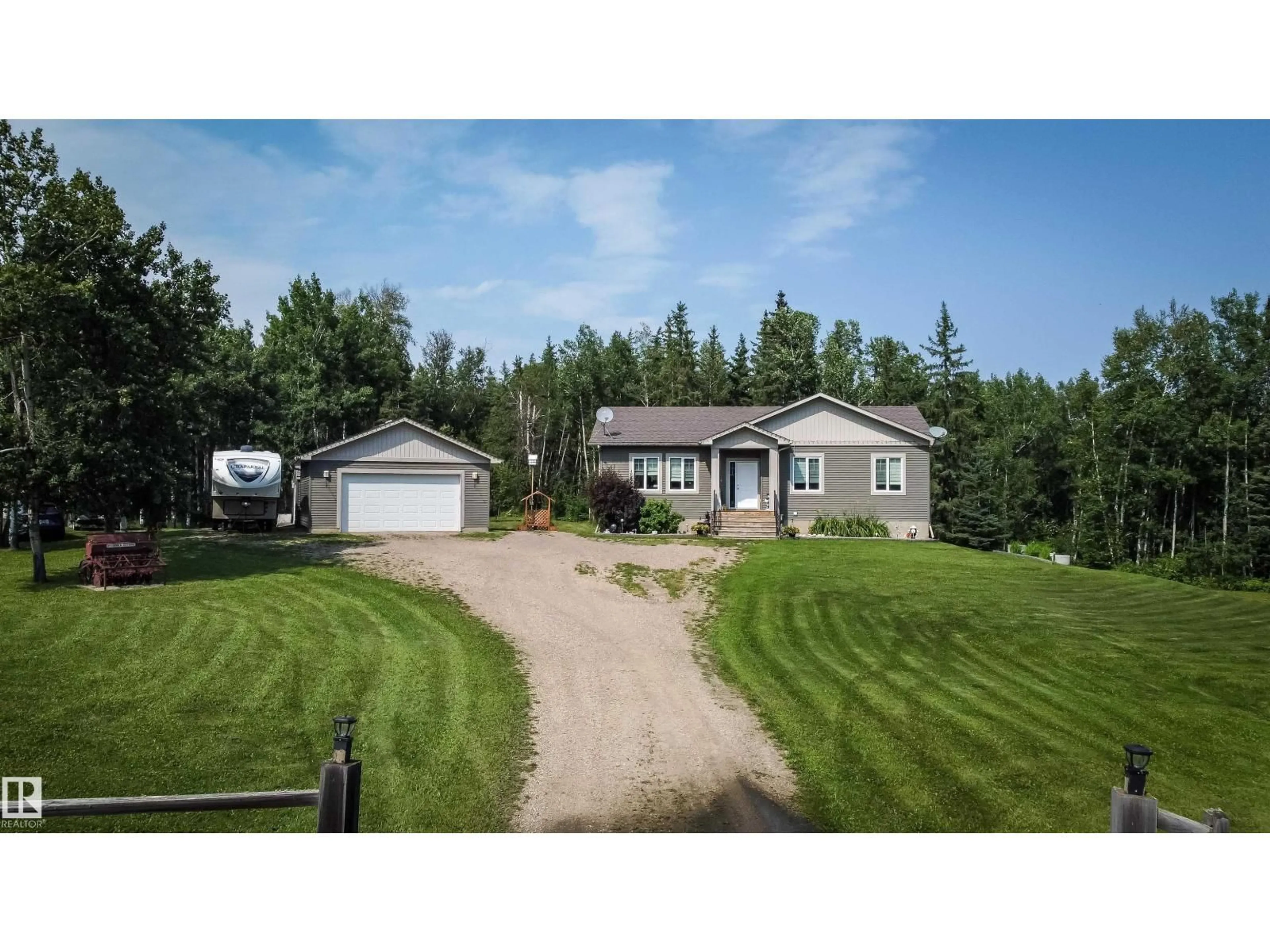 A pic from outside/outdoor area/front of a property/back of a property/a pic from drone, street for 200 55108 RGE ROAD 15, Rural Lac Ste. Anne County Alberta T0E1V0